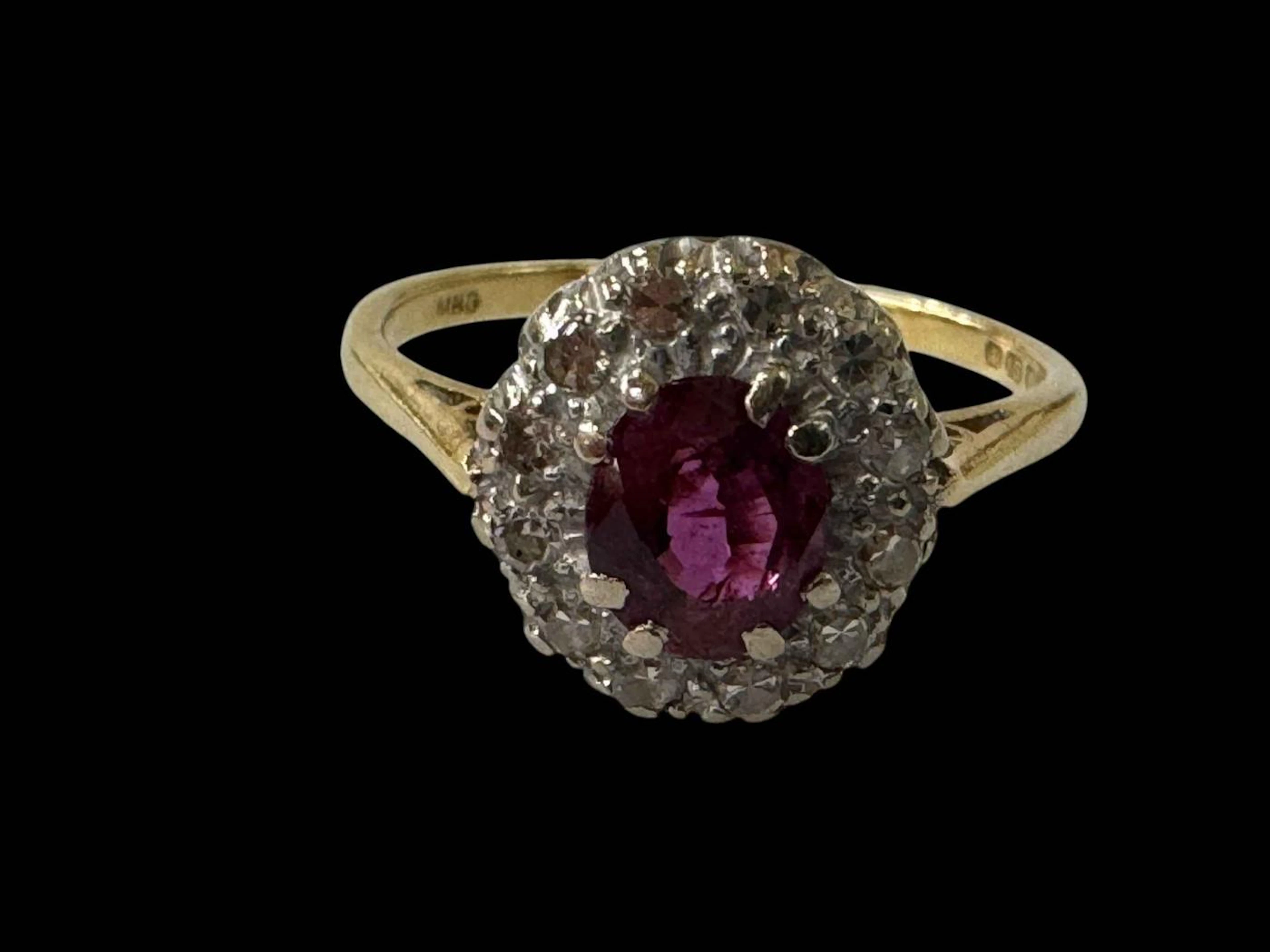 Ruby and diamond cluster 18 carat gold ring, hallmarked London 1965, size N.