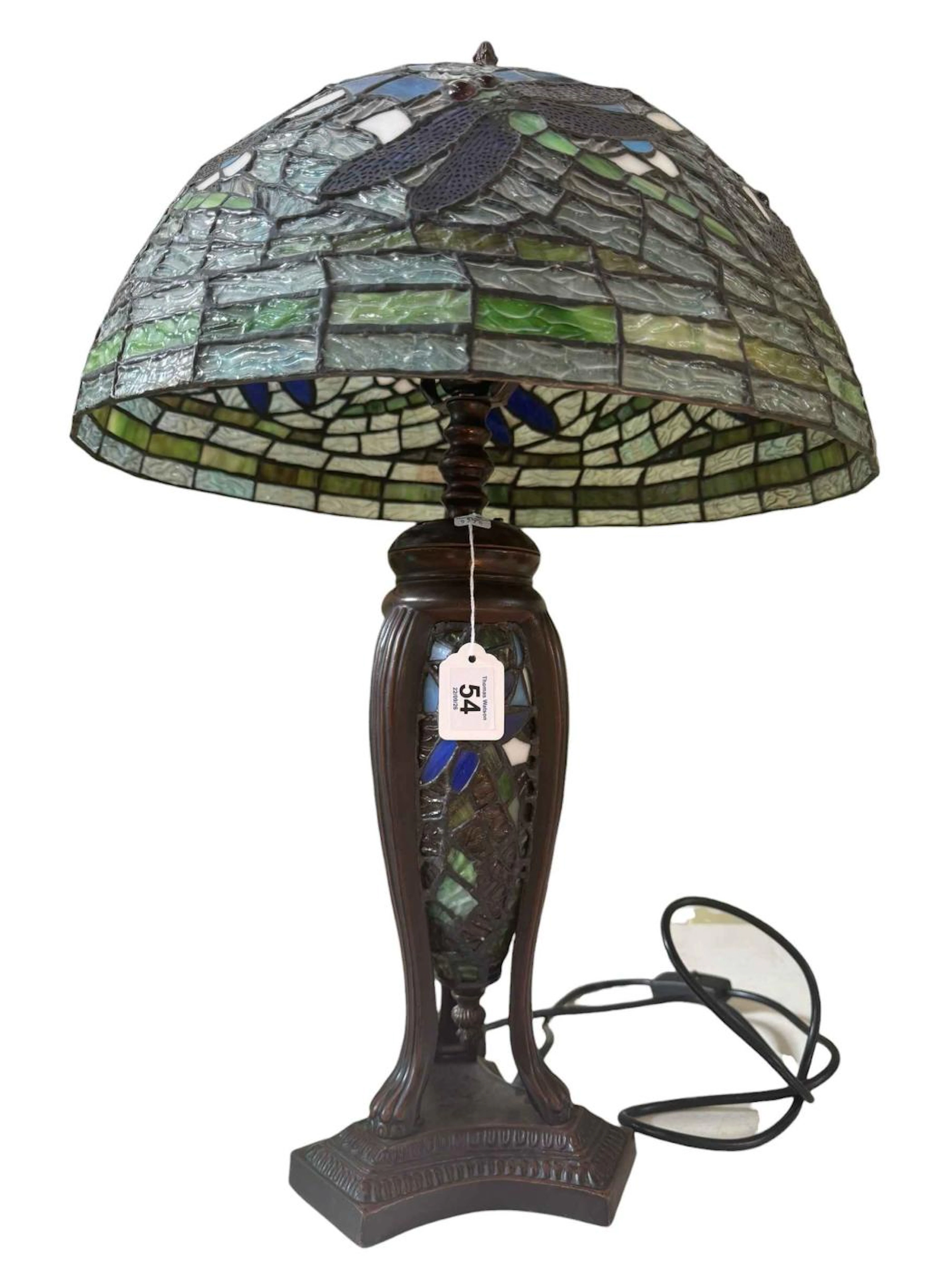 Tiffany style table lamp featuring a dragonfly pattern design.