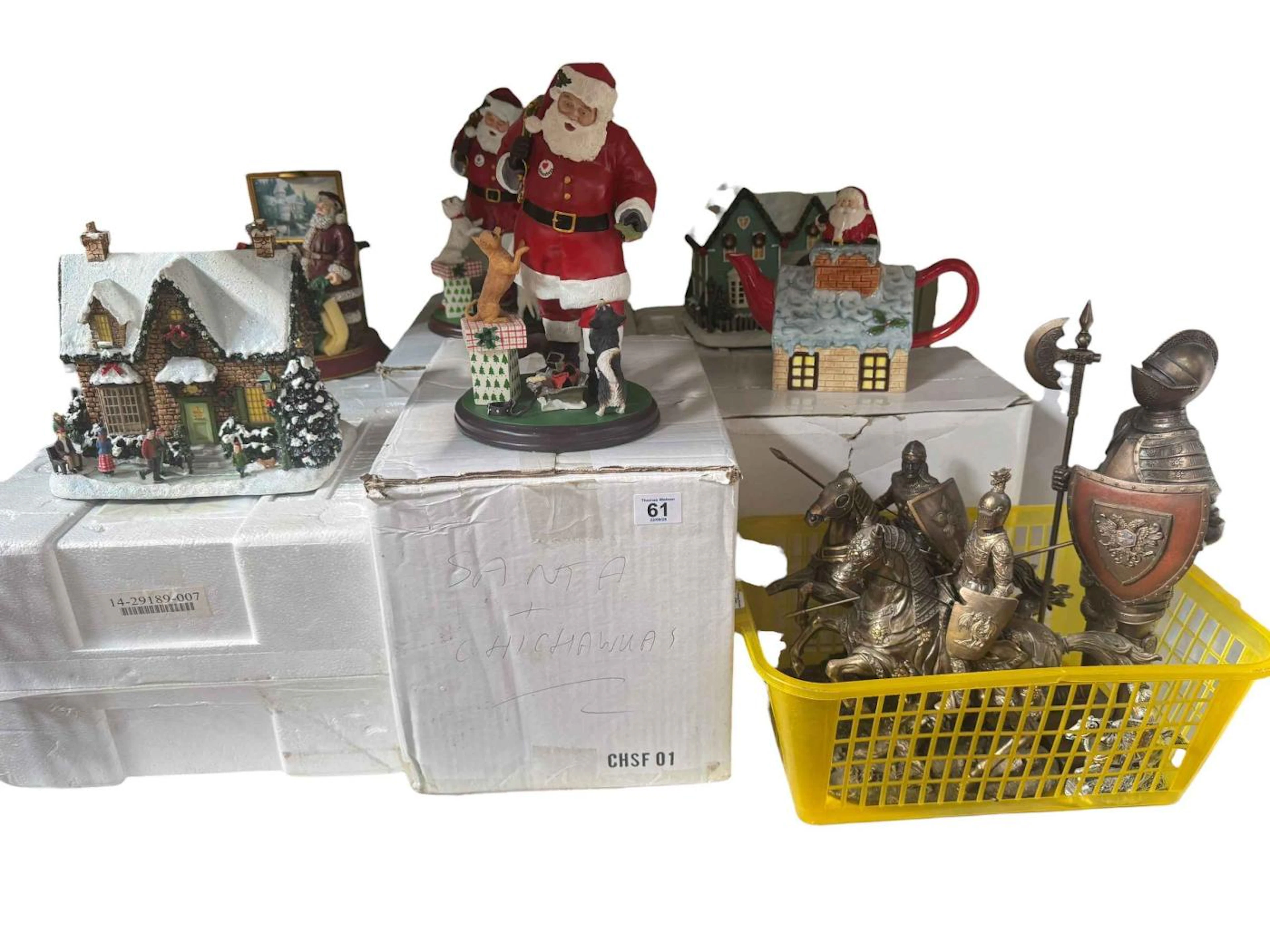 Collection of Christmas decorative figures and houses including two