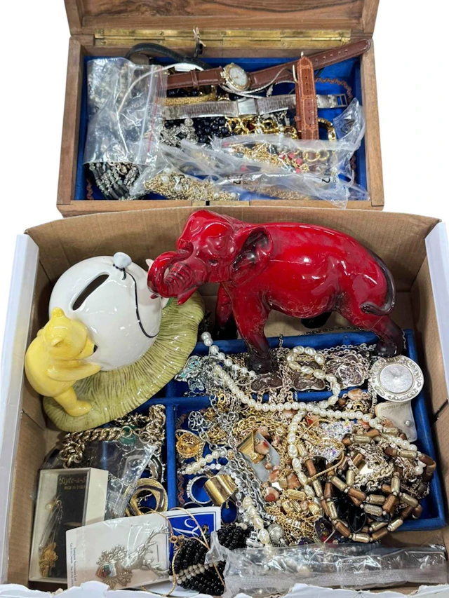 Two boxes with jewellery, watches, and Royal Doulton Flambé elephant