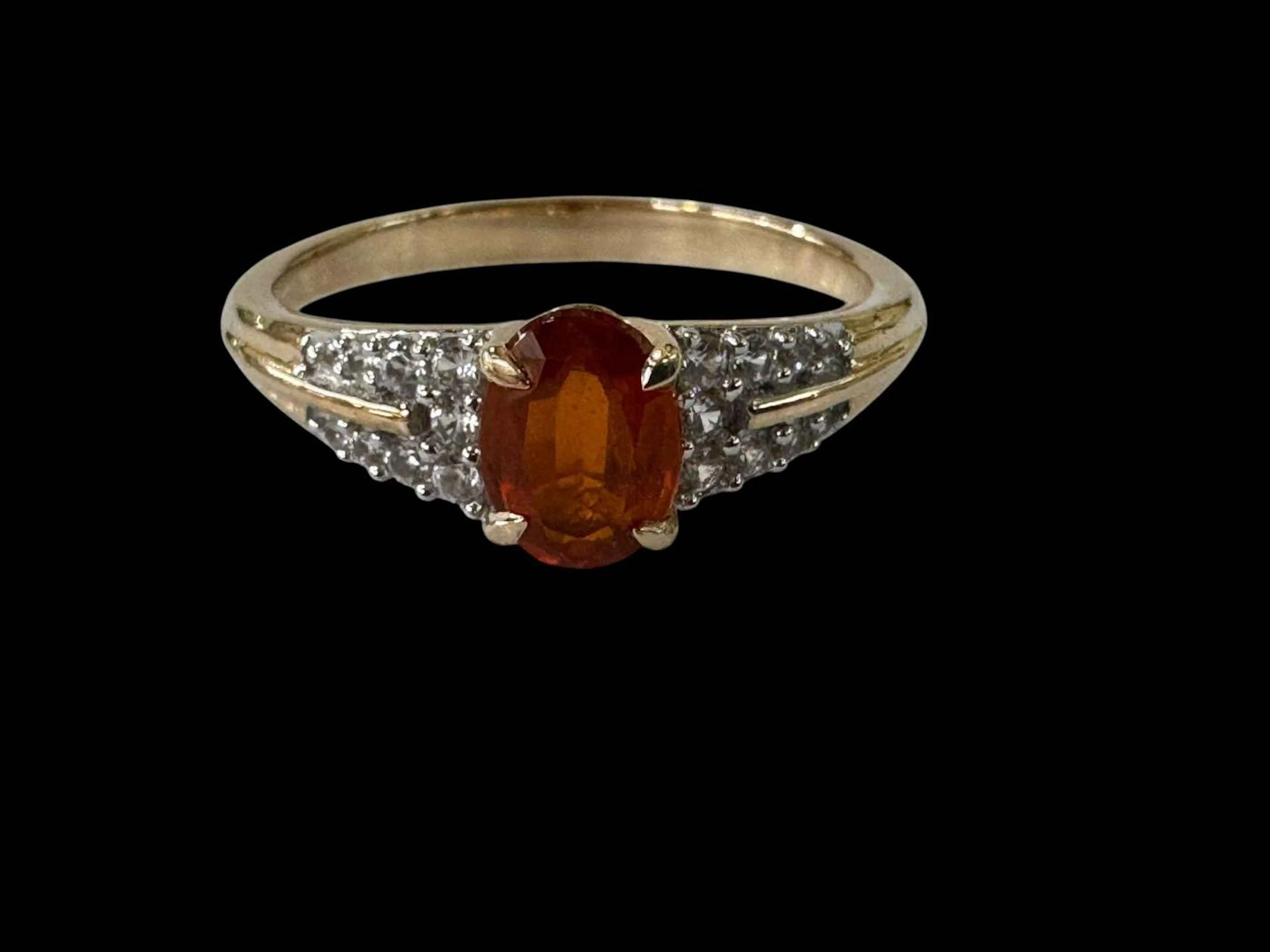 Tangerine garnet and zircon 9k gold ring, size S.