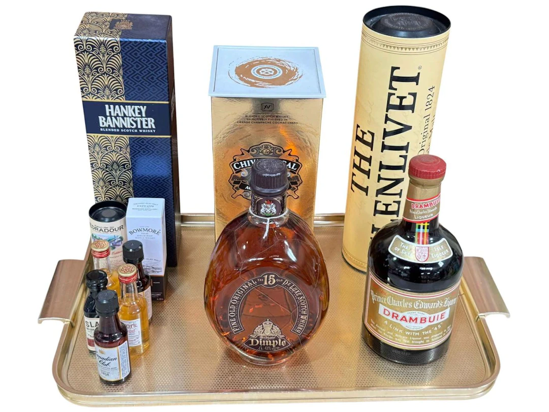 Four bottles of Whisky, Hankey Bannister, Dimple, Glenlivet and Chivas