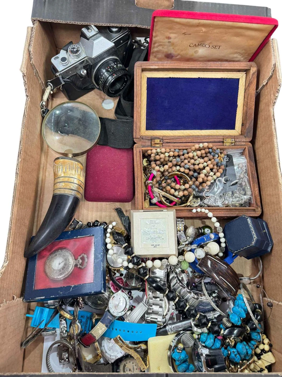 Box of costume jewellery, wristwatches, Praktica camera, etc.