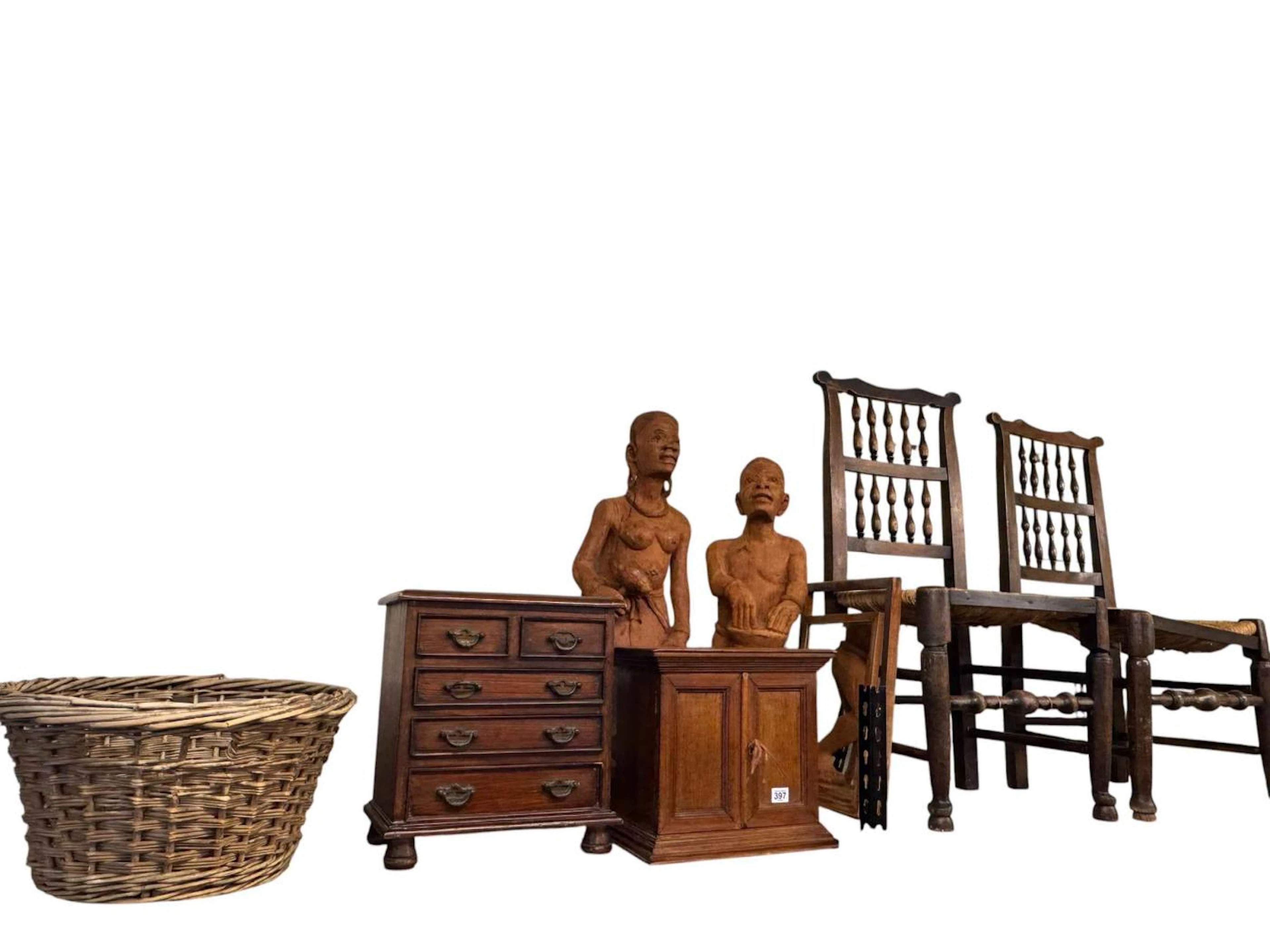 Two rush seated chairs, two carved African figures, small specimen