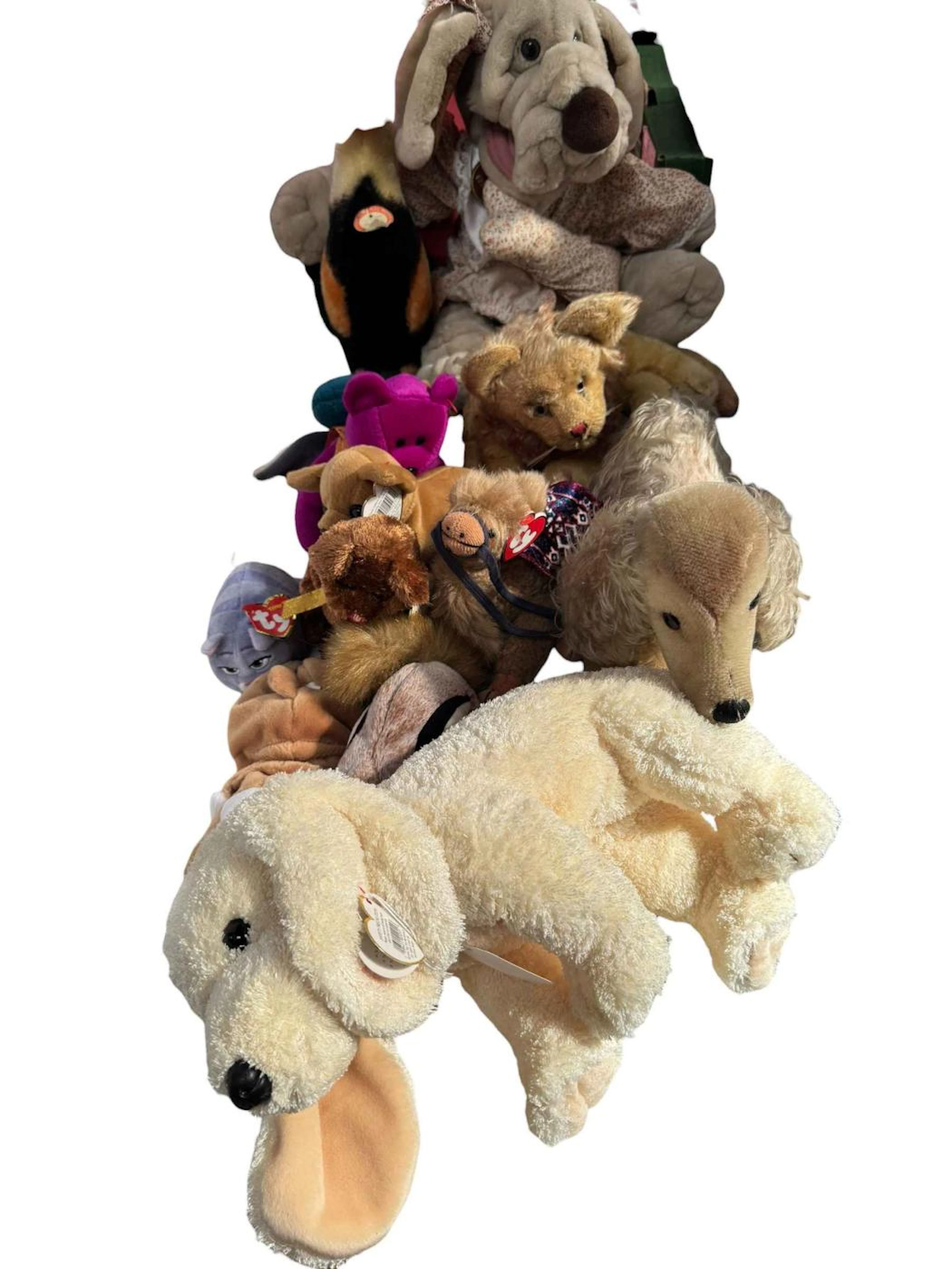 Three vintage Steiff plush toys including 'Waldi' dachshund, 'Leo'