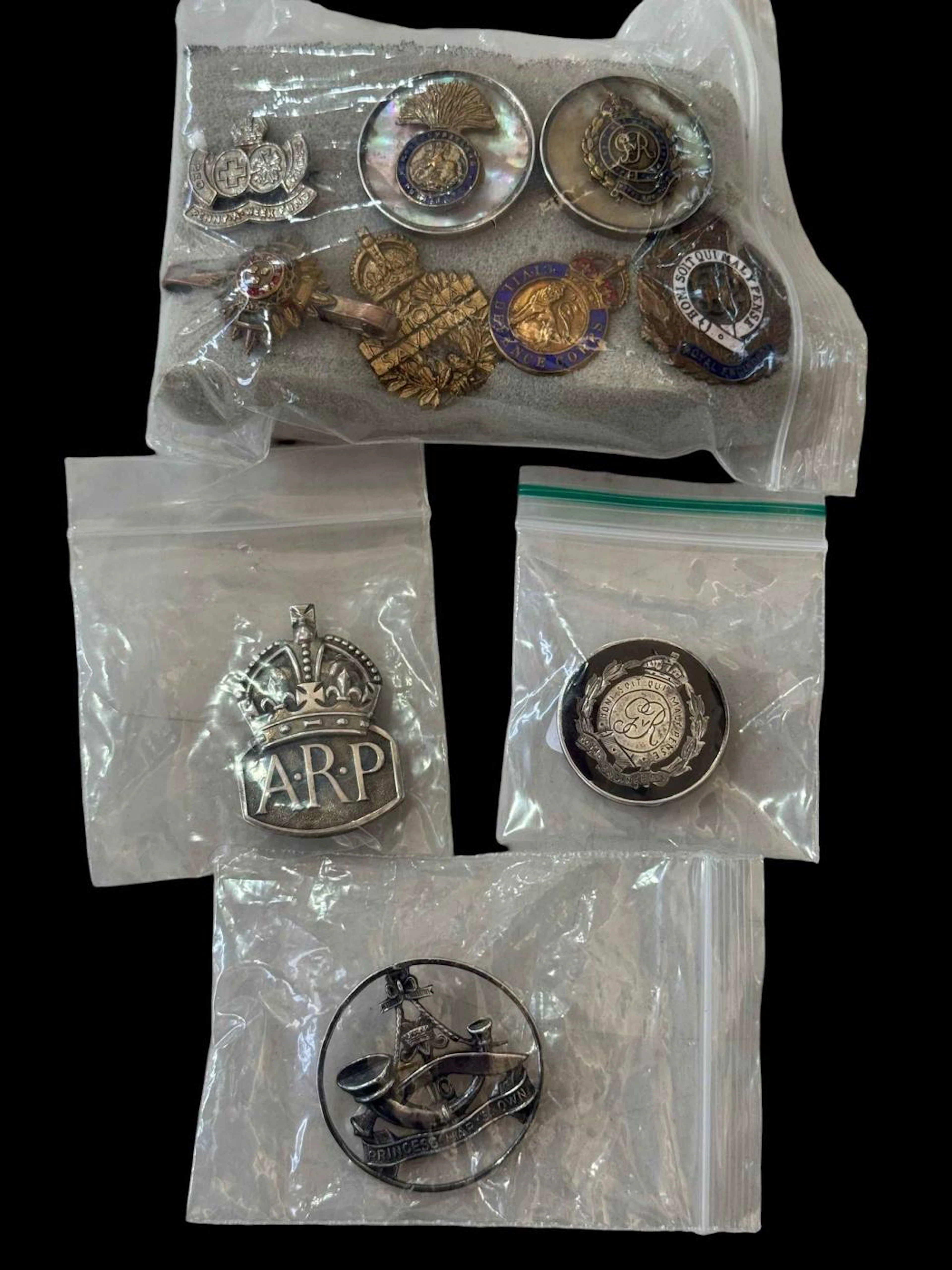 ARP and other badges including silver.