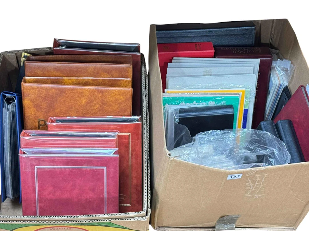 Two boxes of stamps and albums including Channel Islands, Isle of White, etc.
