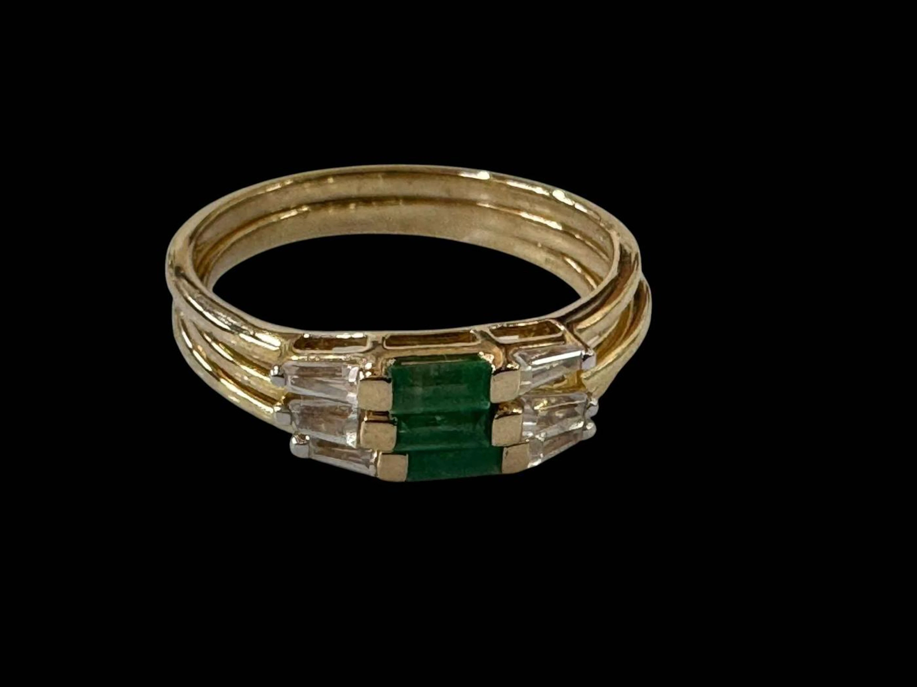 Brazilian emerald and zircon 9k gold triple ring set, sizes P/Q.