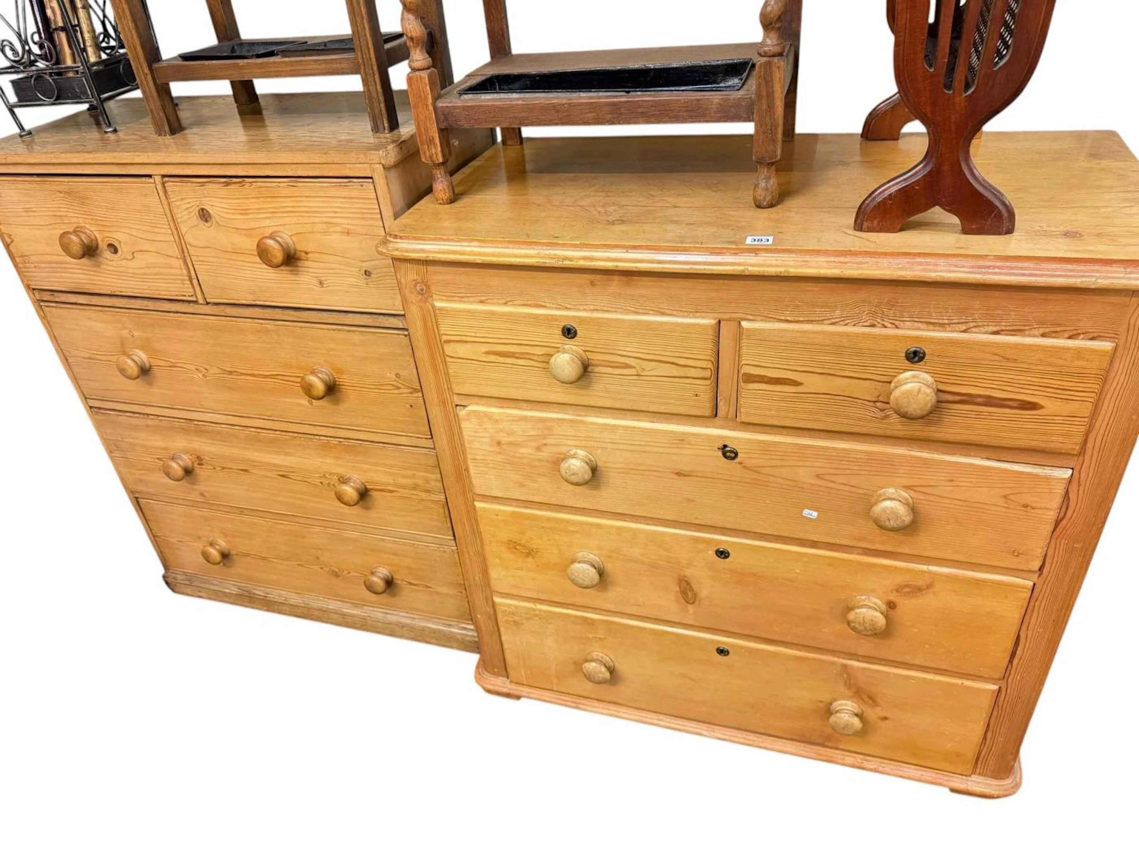 Two four height pine chests of drawers.