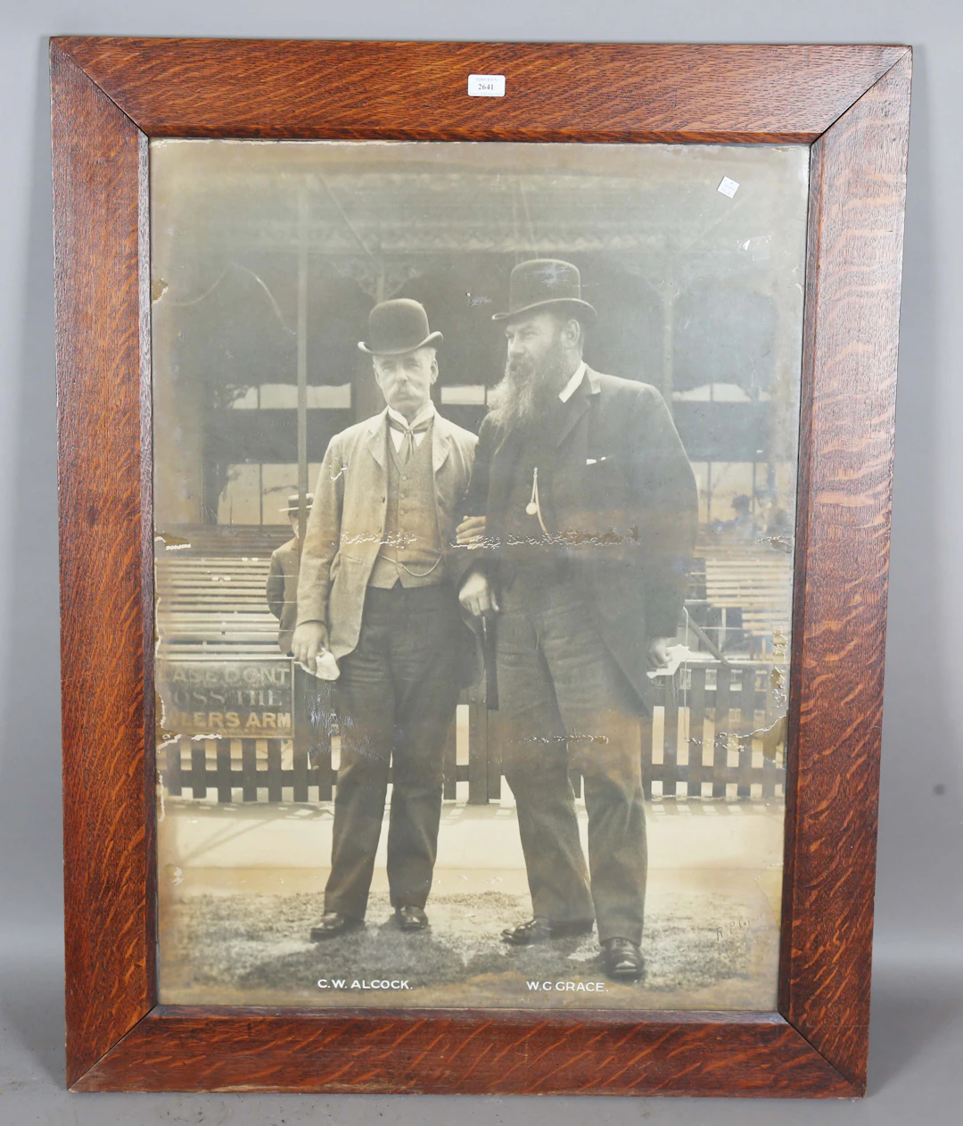 A large format black and white photograph of W.G. Grace and C.W. Alcock