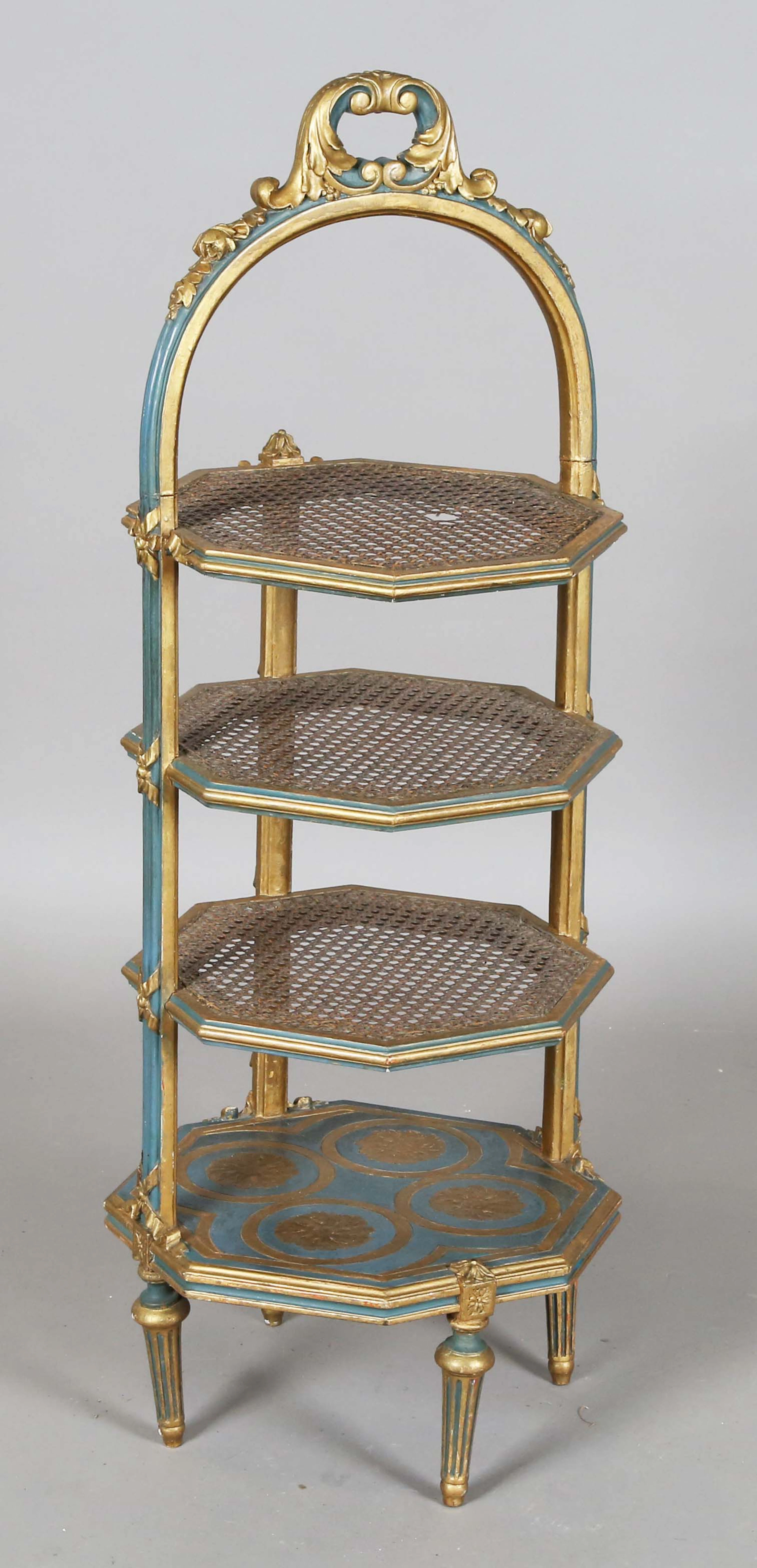 An early 20th century gilt painted four-tier cakestand, each caned