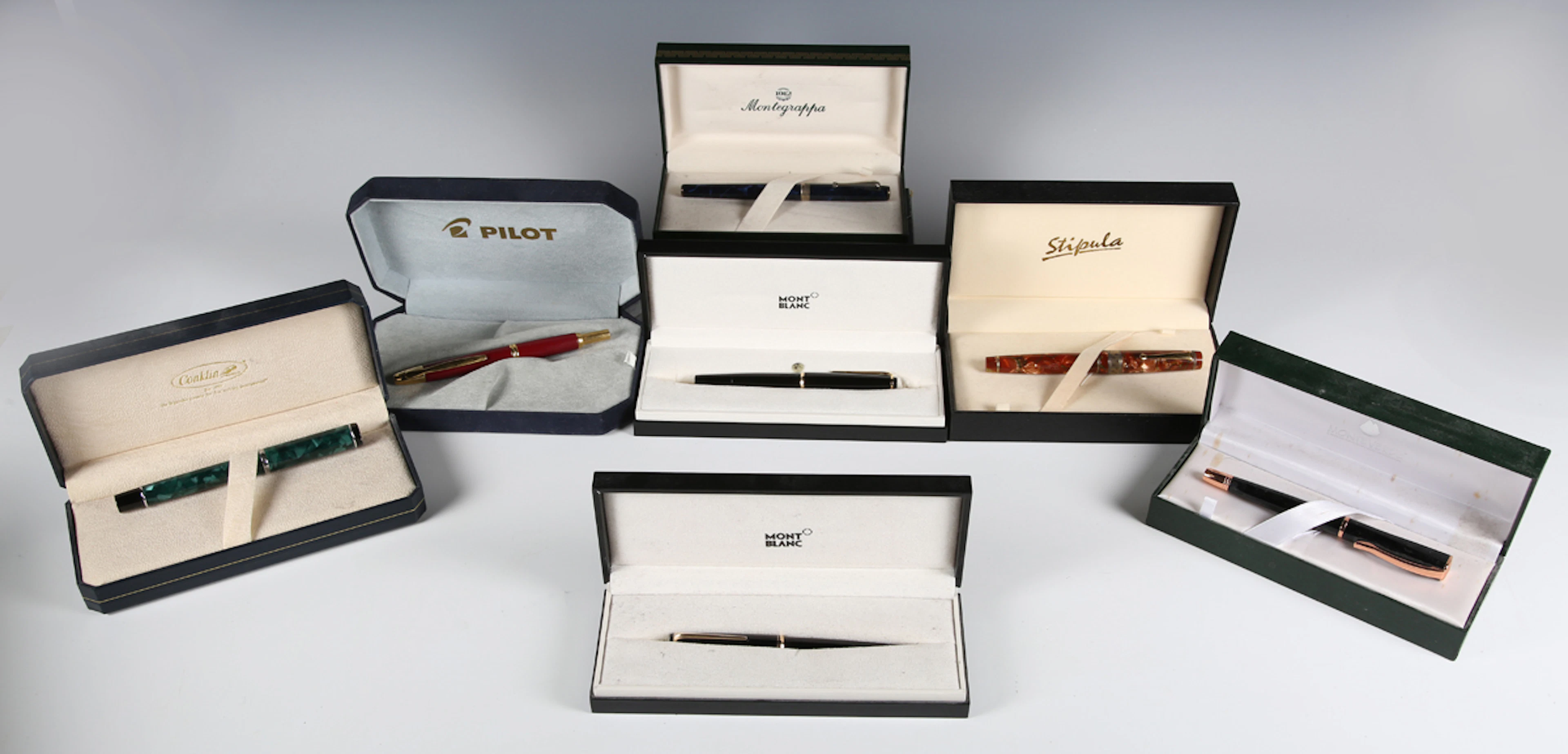 A collection of modern fountain pens, including Stipula, Montegrappa