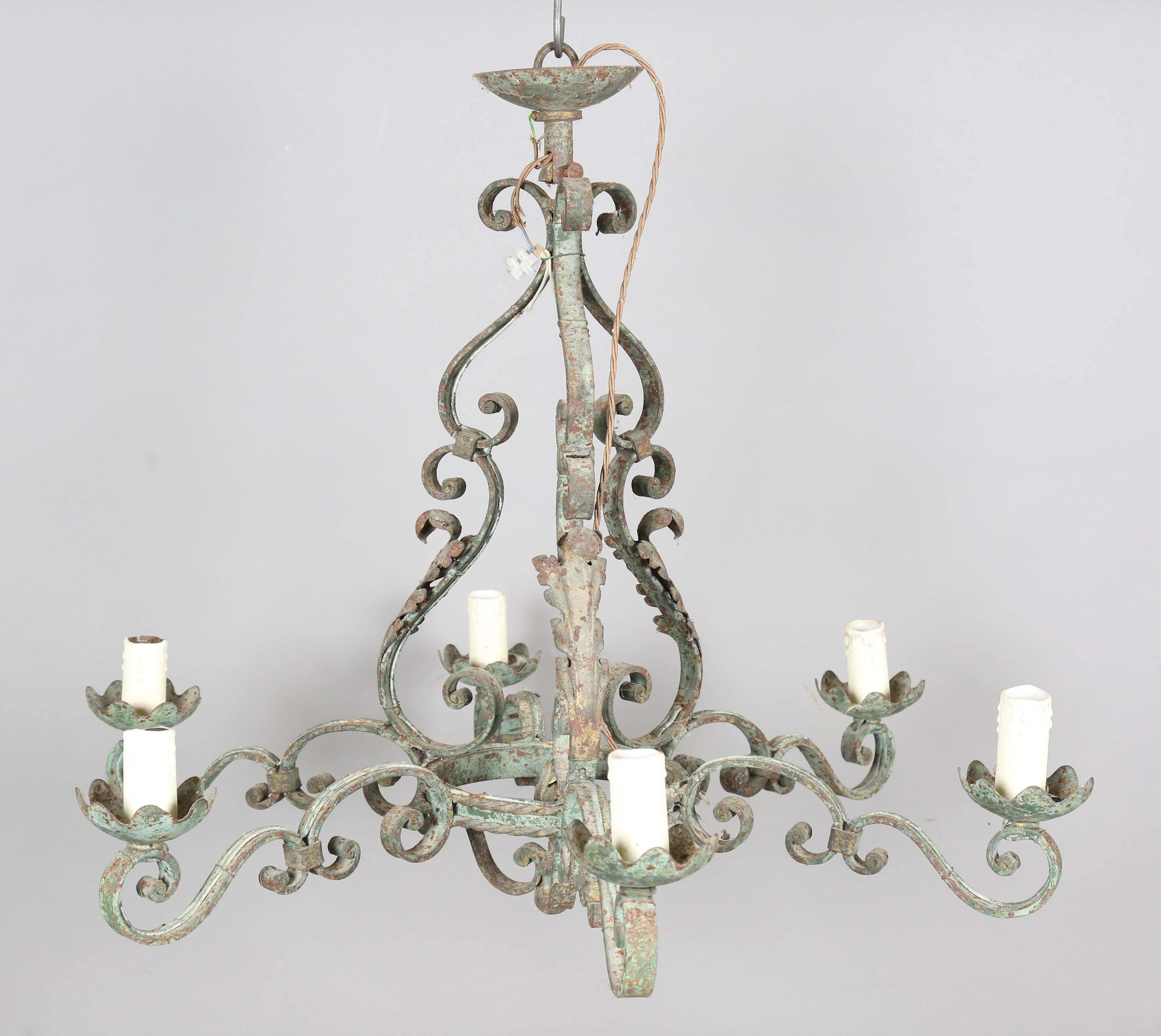 A 20th century verdigris wrought iron six-branch chandelier, height