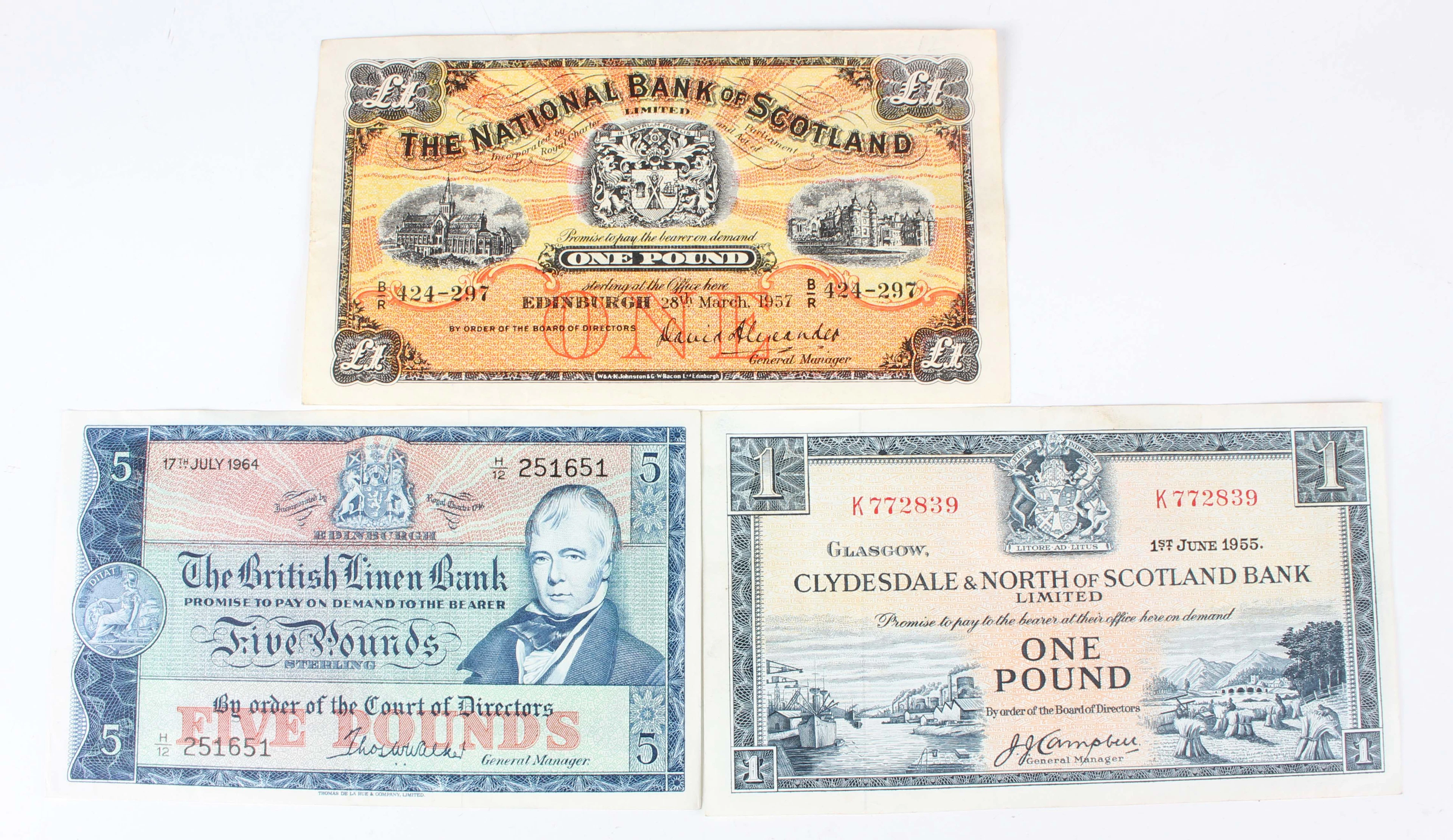 A collection of Scottish banknotes, including a National Bank of Scotland