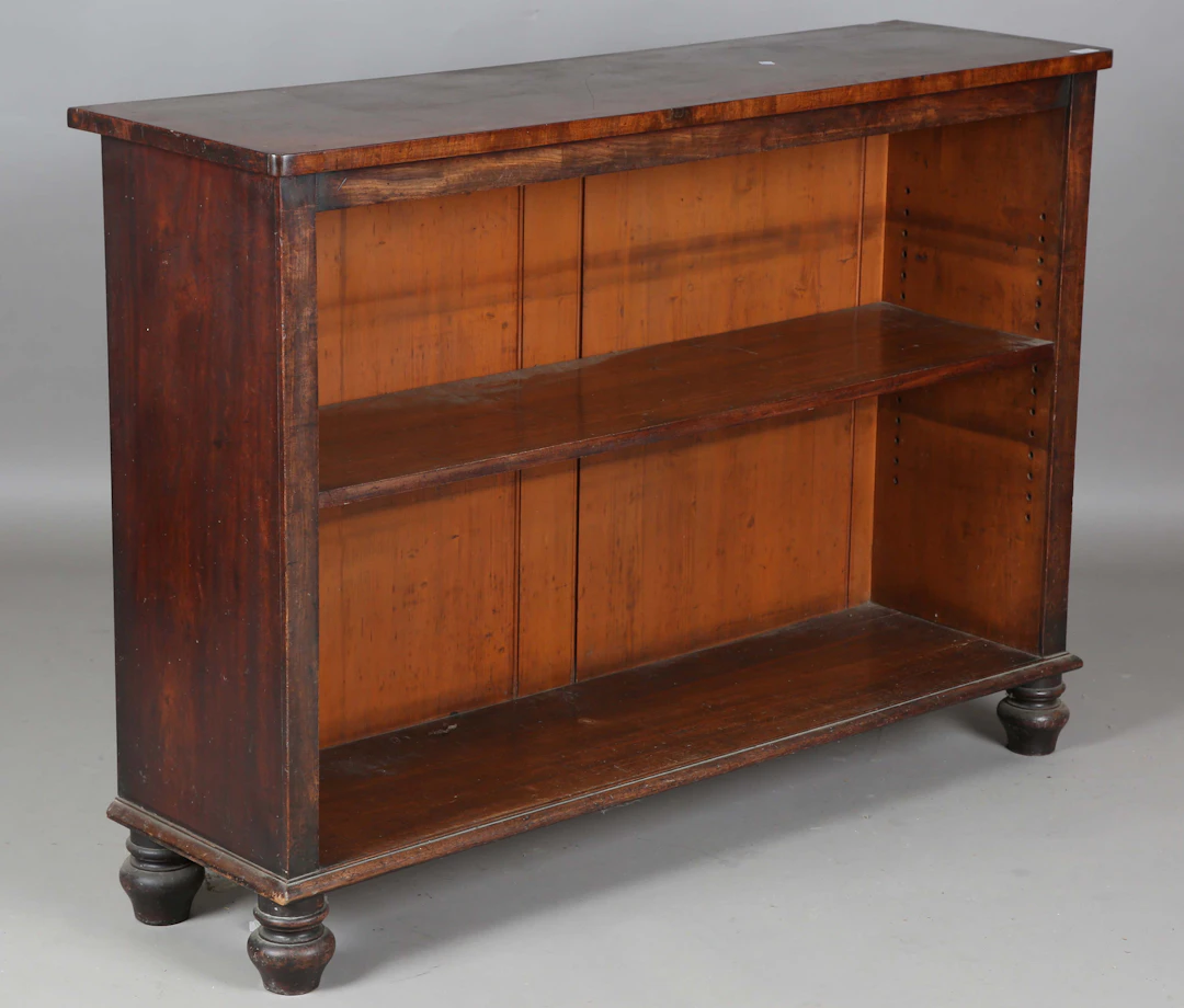 A Victorian mahogany open bookcase, raised on turned feet, height