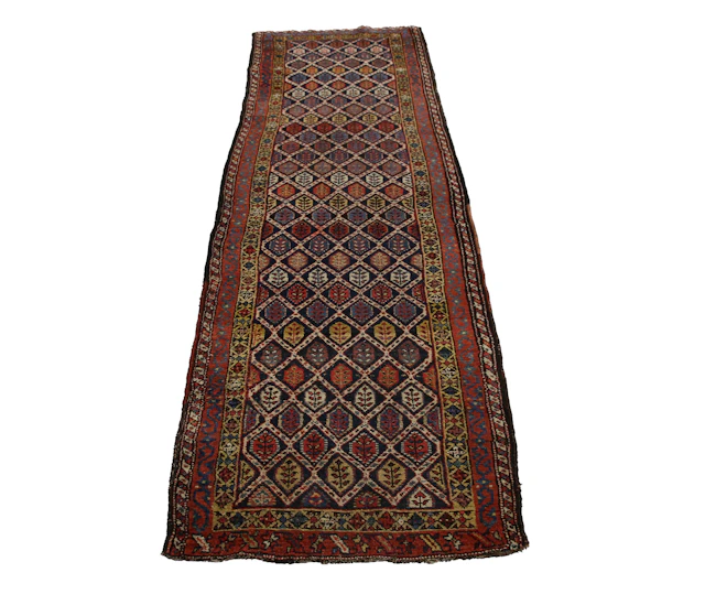 A Kurdish runner, early 20th century, the polychrome floral lattice