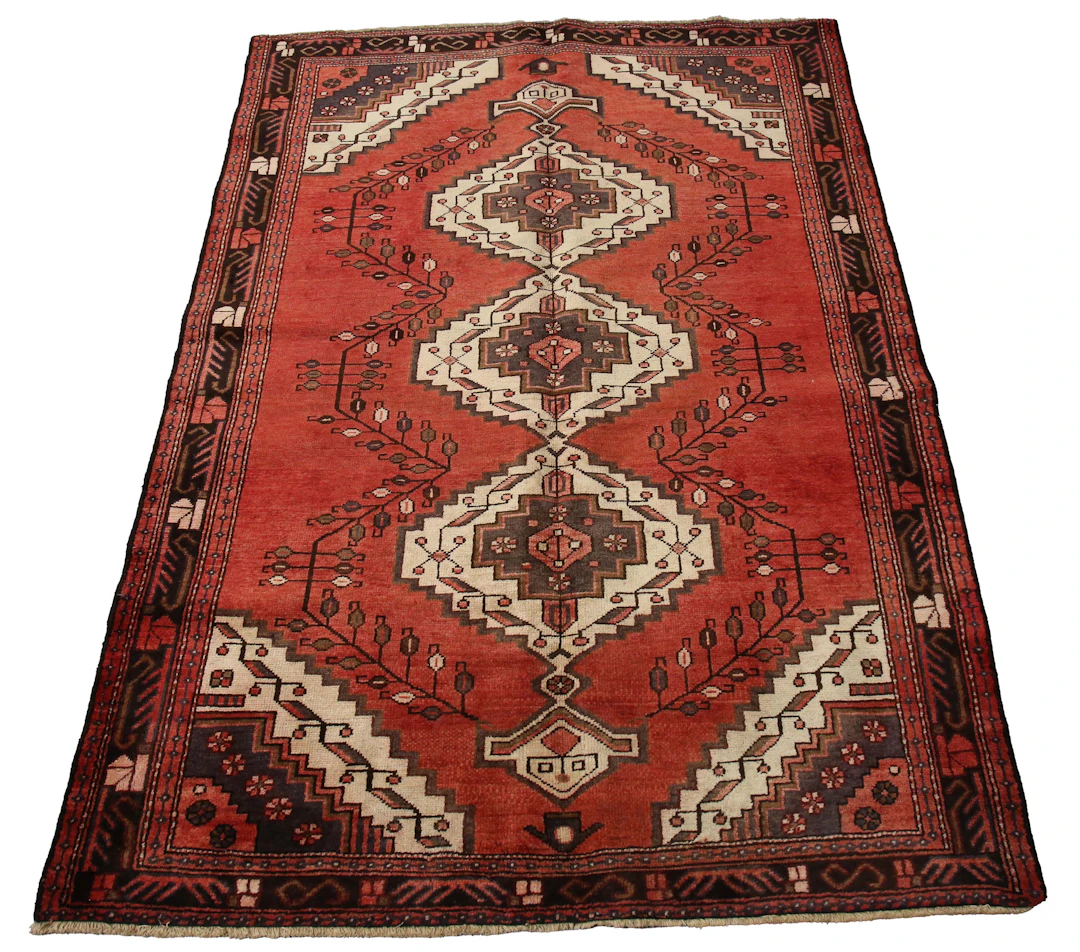 A Hamadan rug, North-west Persia, late 20th century, the red field