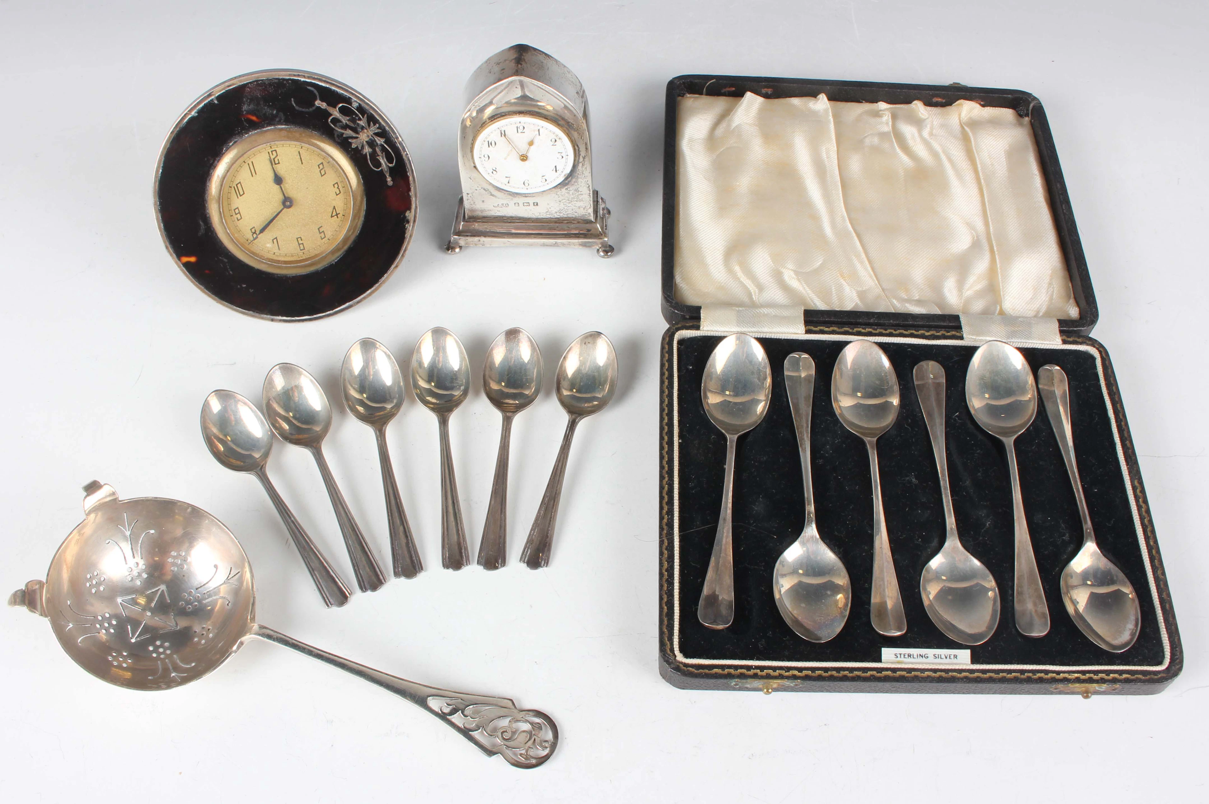 A small group of silver and silver mounted items, including a tea