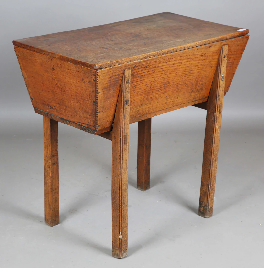 A 19th century provincial elm dough bin, raised on block legs, height