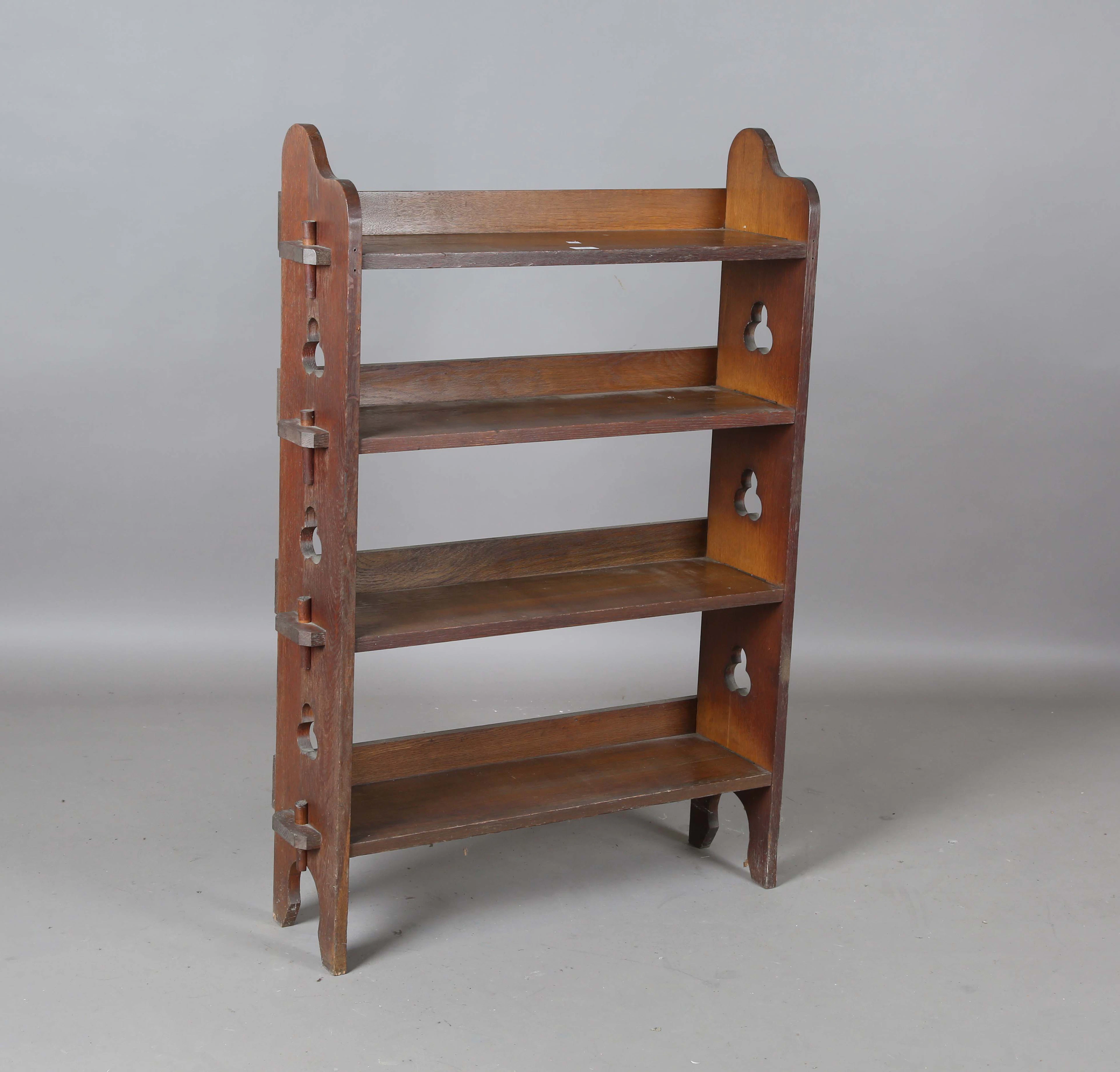 An early 20th century Arts and Crafts oak four-tier 'Sedley' open