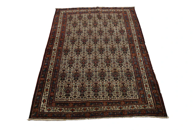 An Abadeh rug, West Persia, early 20th century, the ivory field with
