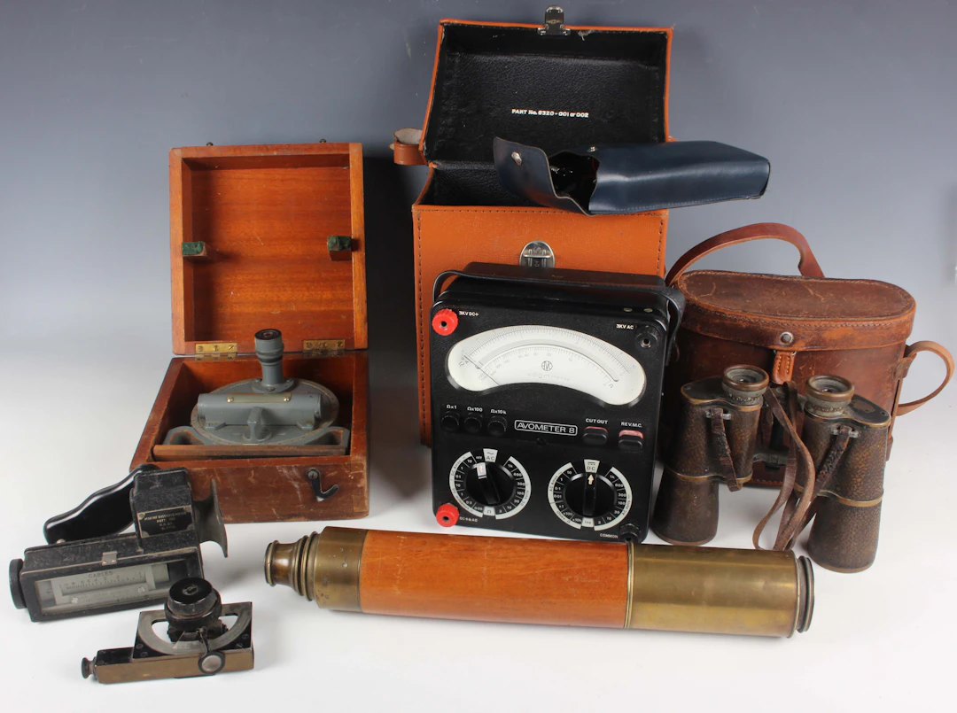 An early 20th century mahogany and gilt lacquered brass two-draw telescope