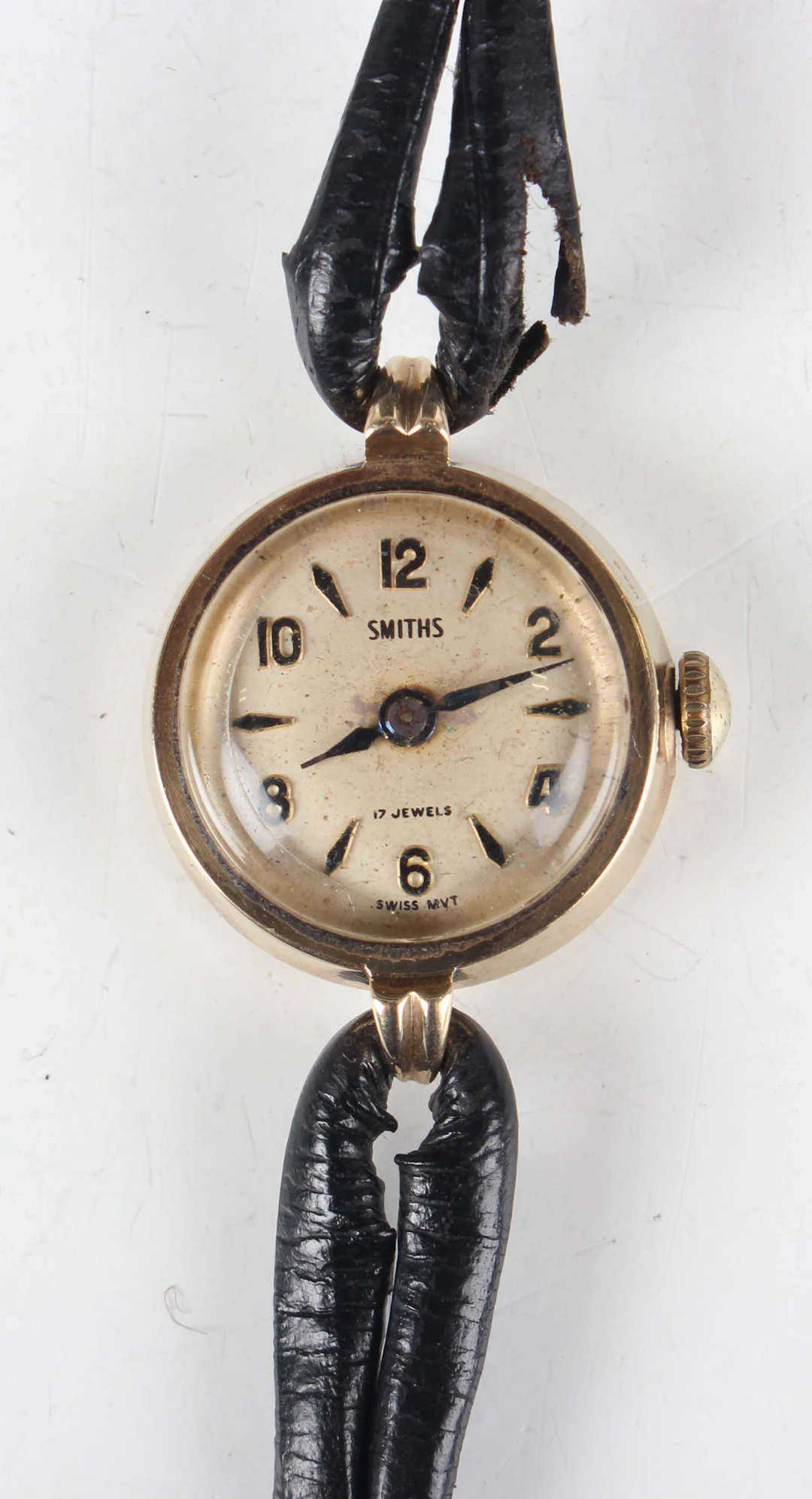 A Smith's 9ct gold circular cased lady's wristwatch, the signed silvered