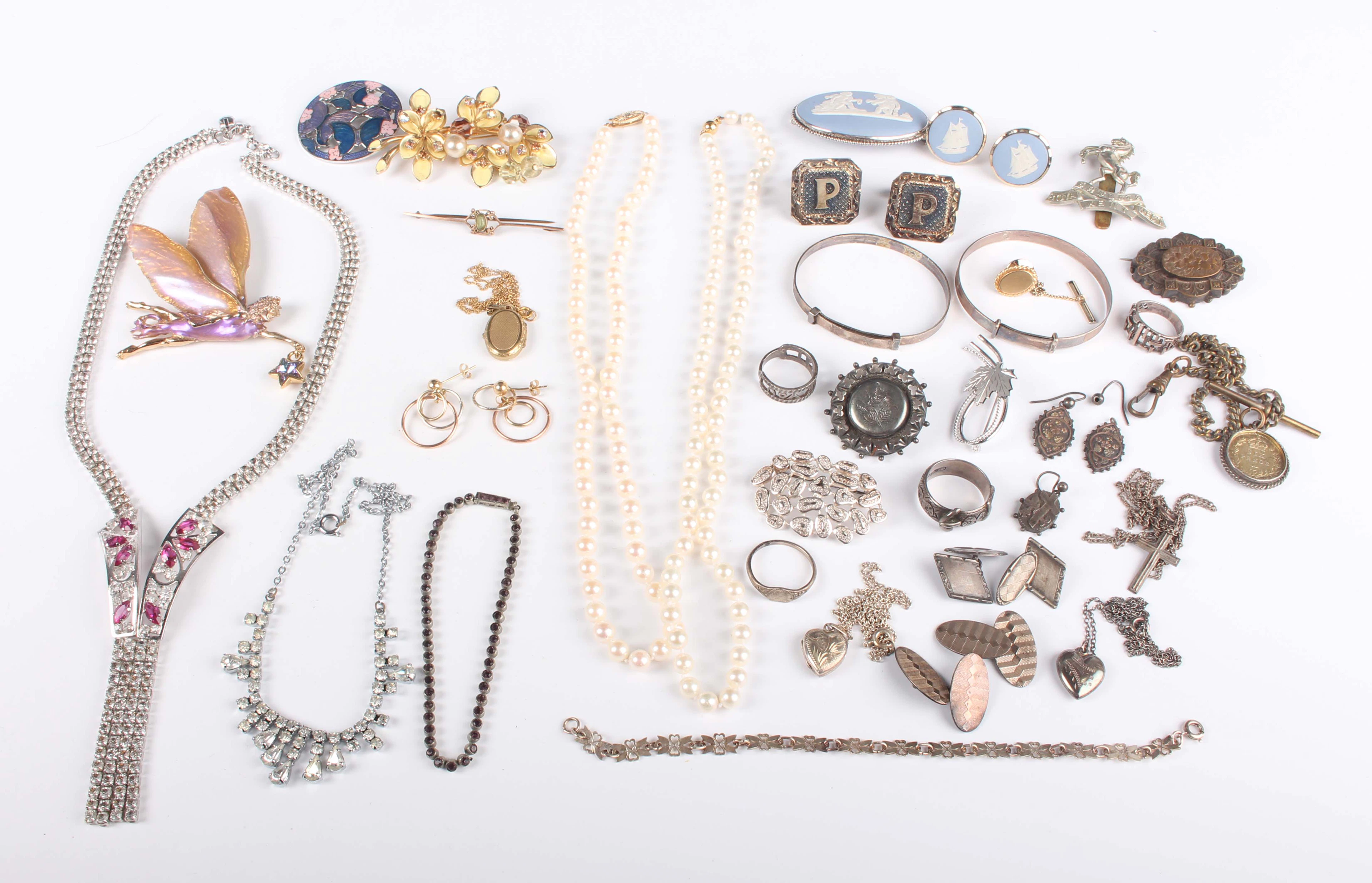 Two single row necklaces of cultured pearls, each on a gold clasp