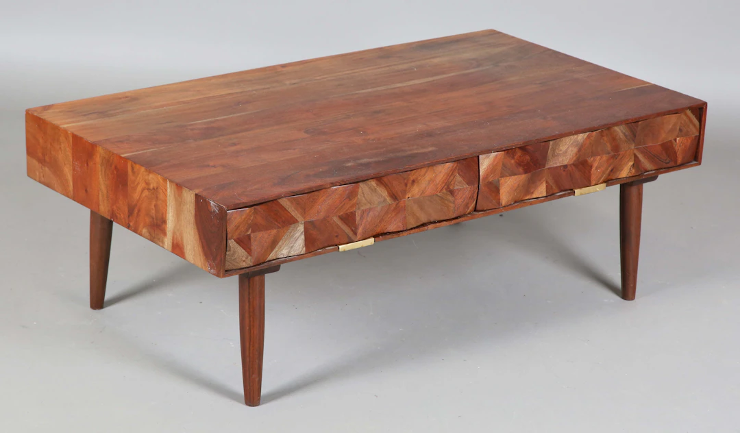 A mid/late 20th century hardwood coffee table, fitted with two facet-fronted