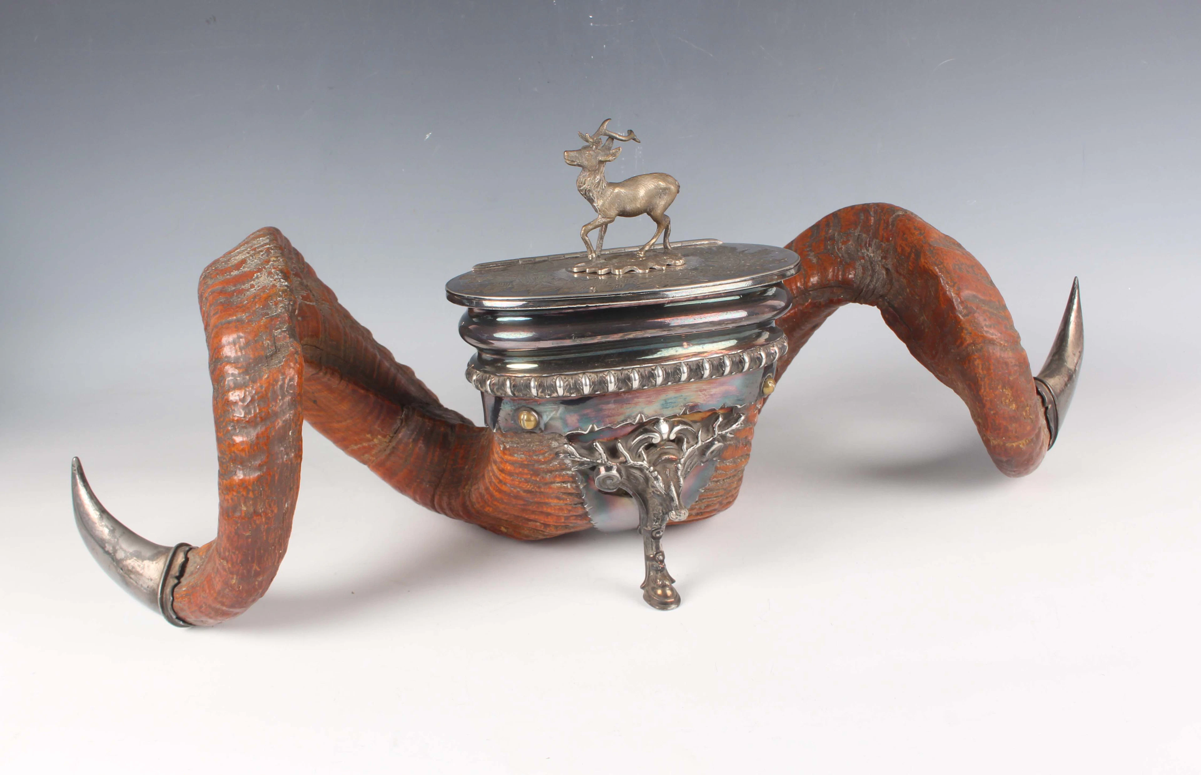 A Victorian plate mounted ram's horn desk inkstand, the oval hinged