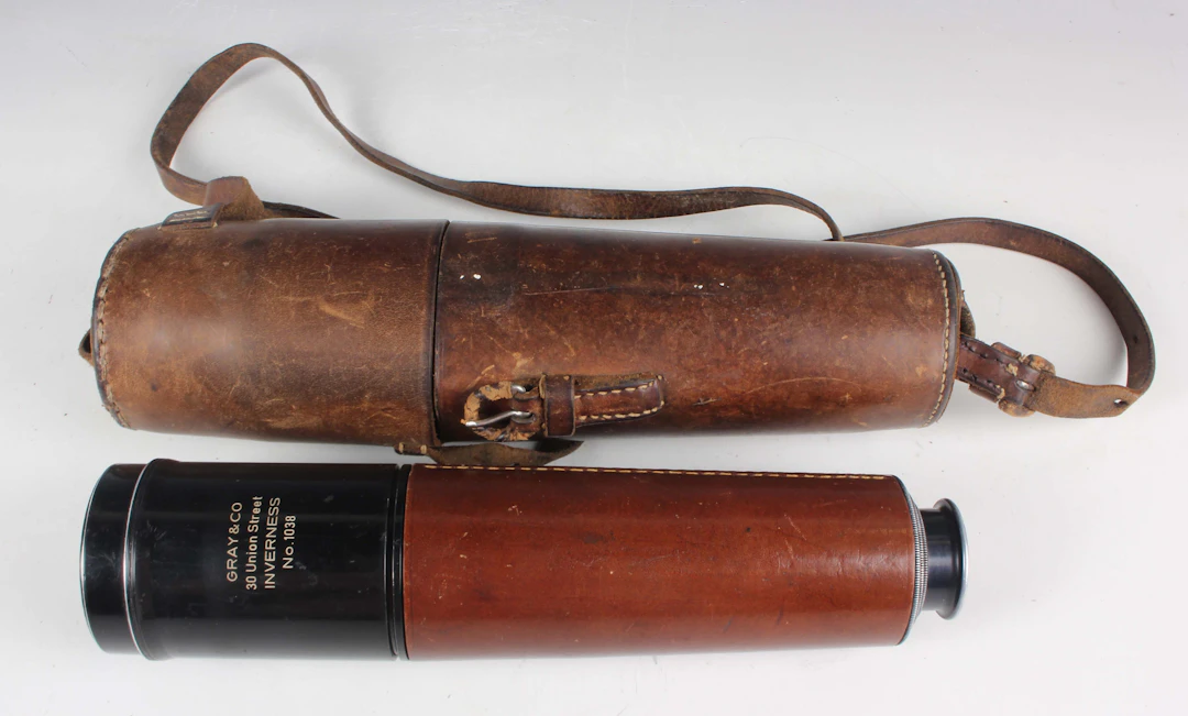A Gray & Co of Inverness brown leather bound and black enamelled three-draw