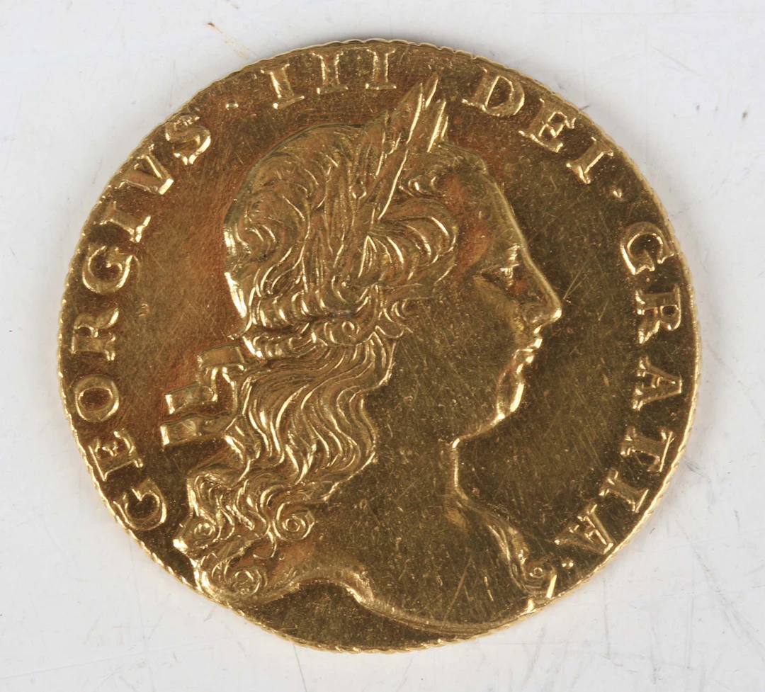 A George III guinea 1766, third laureate head, Sp 3727 (good/fine