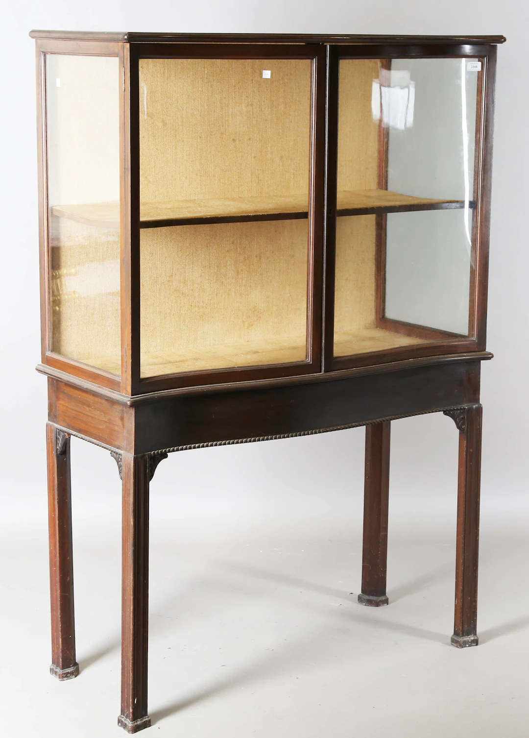 An early 20th century mahogany display case, fitted with a pair of