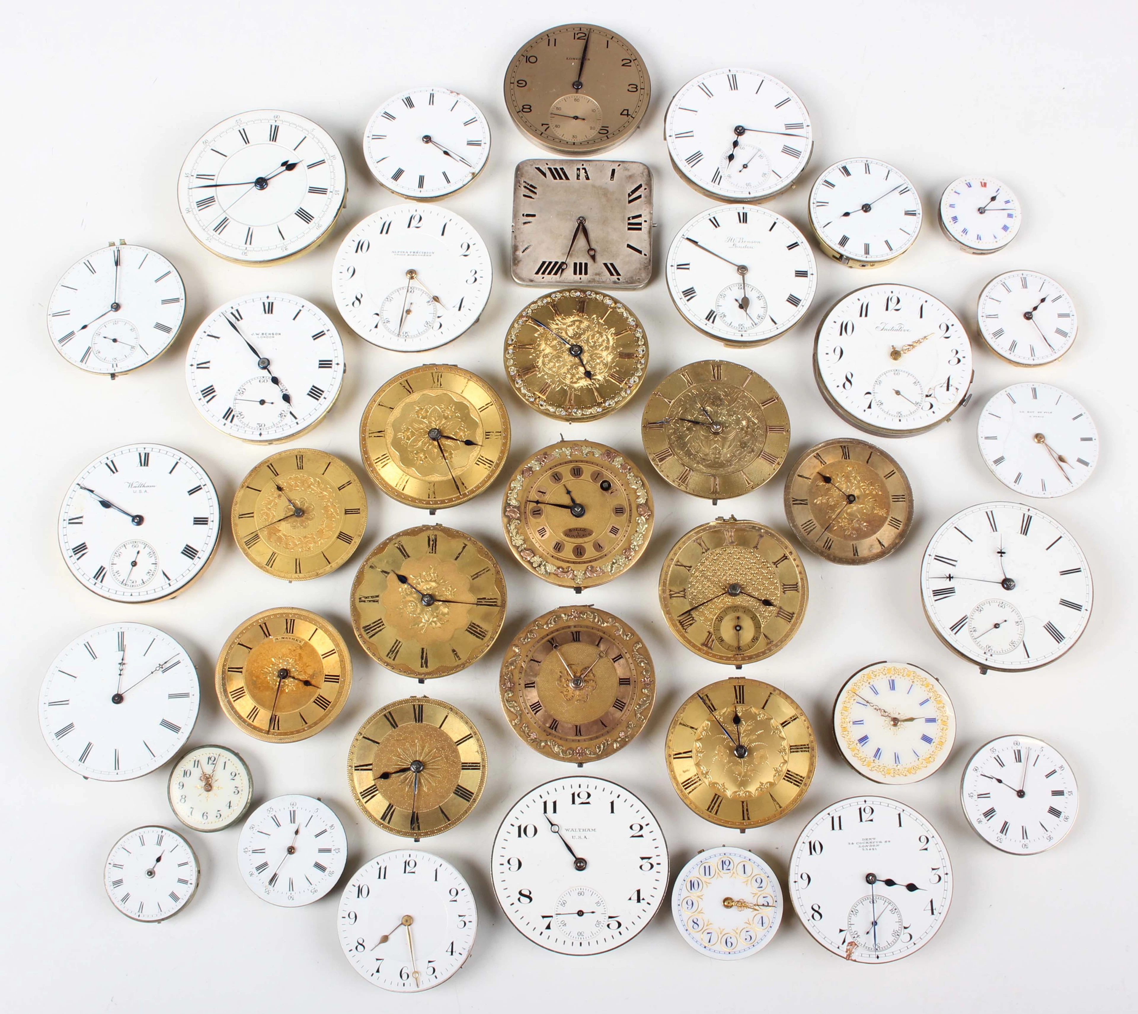 A collection of thirty-eight pocket and fob watch movements and dials