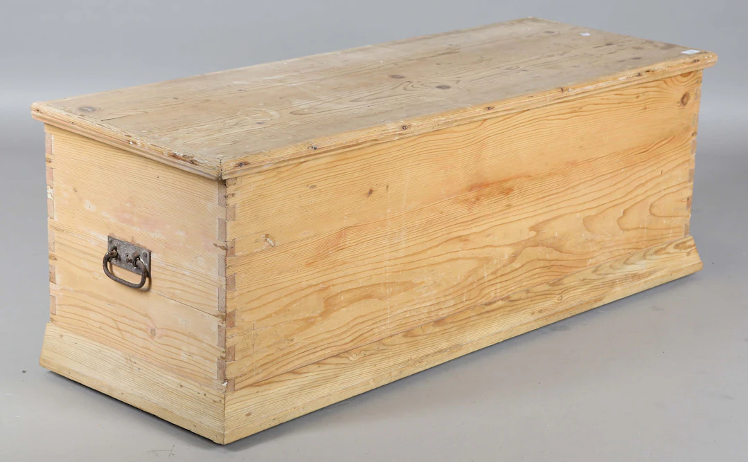 A long 19th century stripped pine trunk, height 47cm, width 130cm