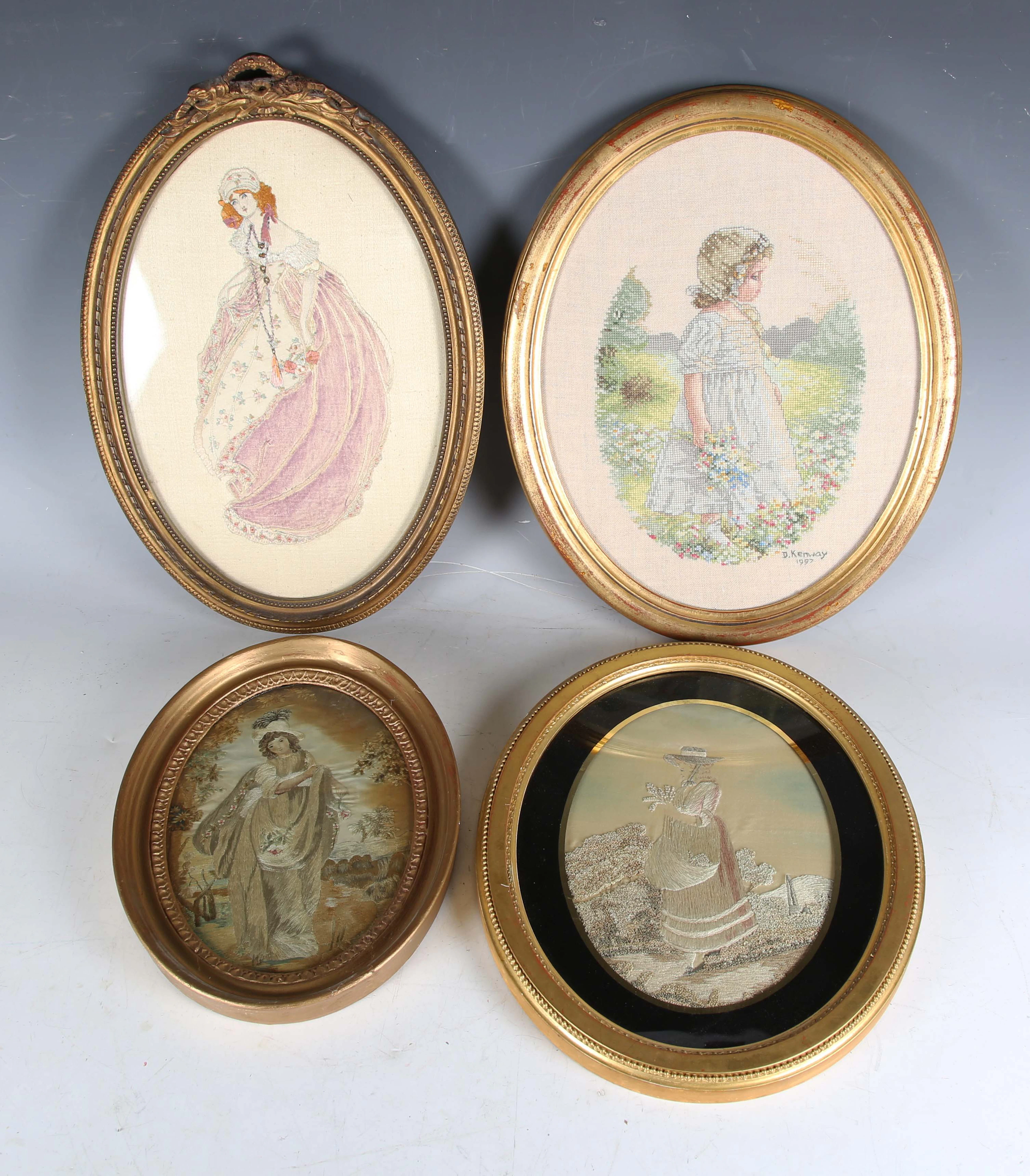 A Regency oval silkwork of a lady walking through a garden, 23cm x