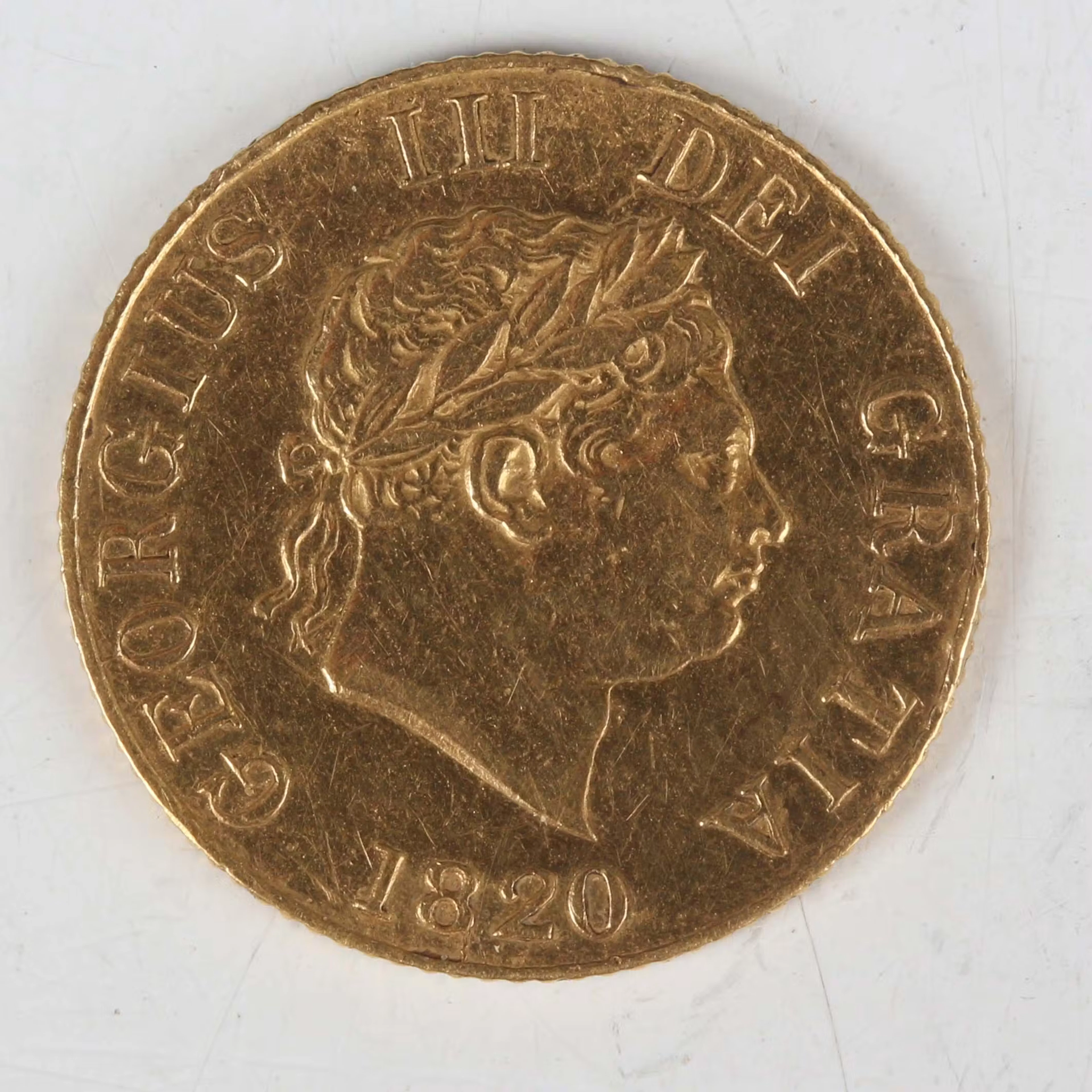 A George III half-sovereign 1820, Sp 3786 (good/very fine). Note: