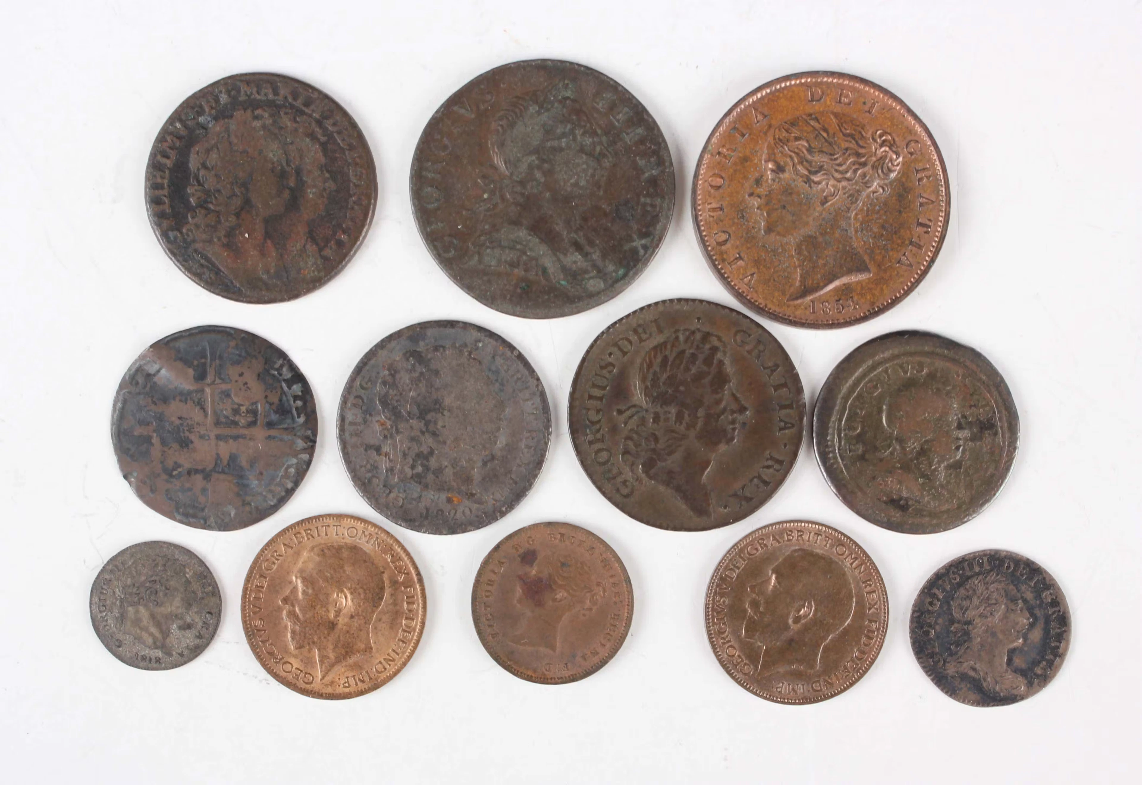 A group of English and Irish coins, comprising two halfpennies, 1773