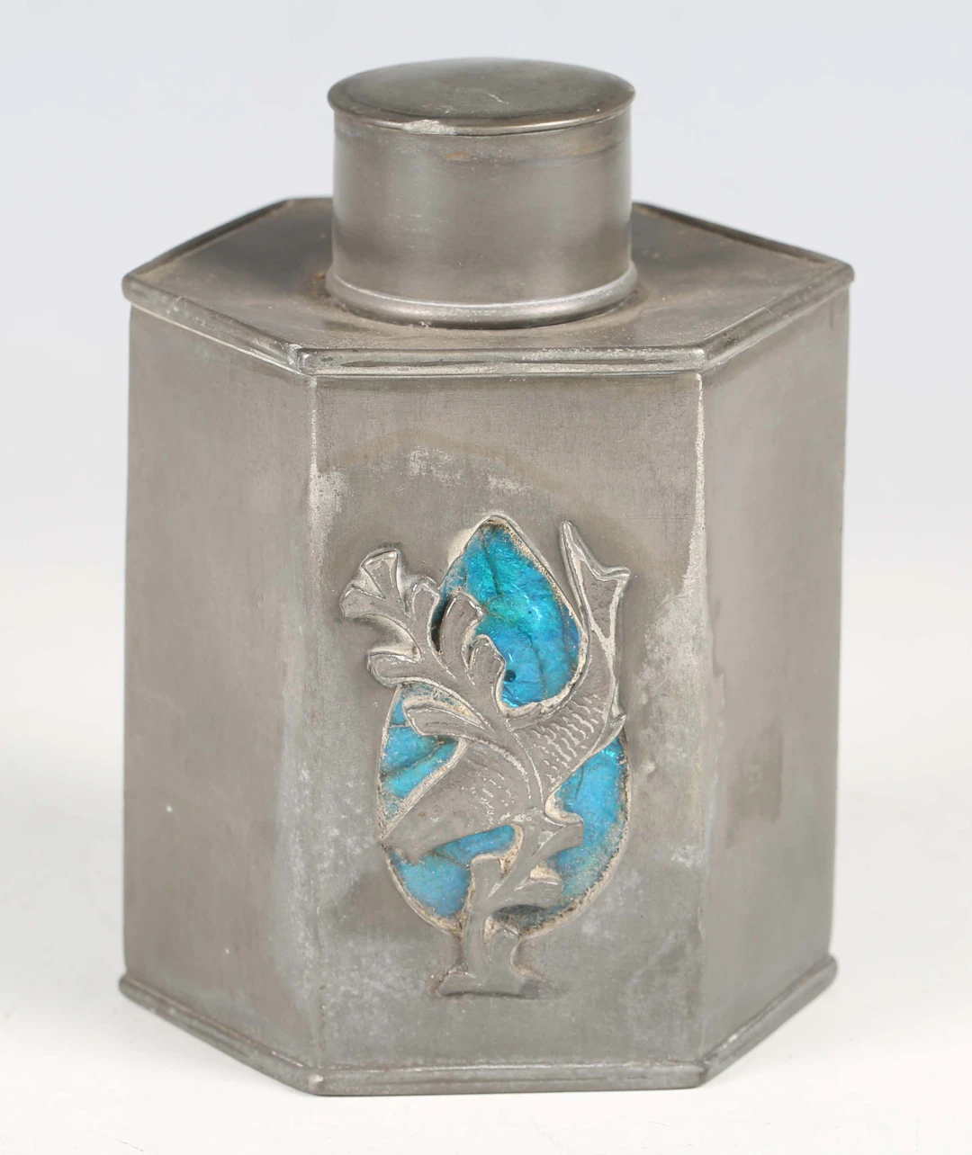 An Art Nouveau Osiris pewter tea caddy, the hexagonal body with an