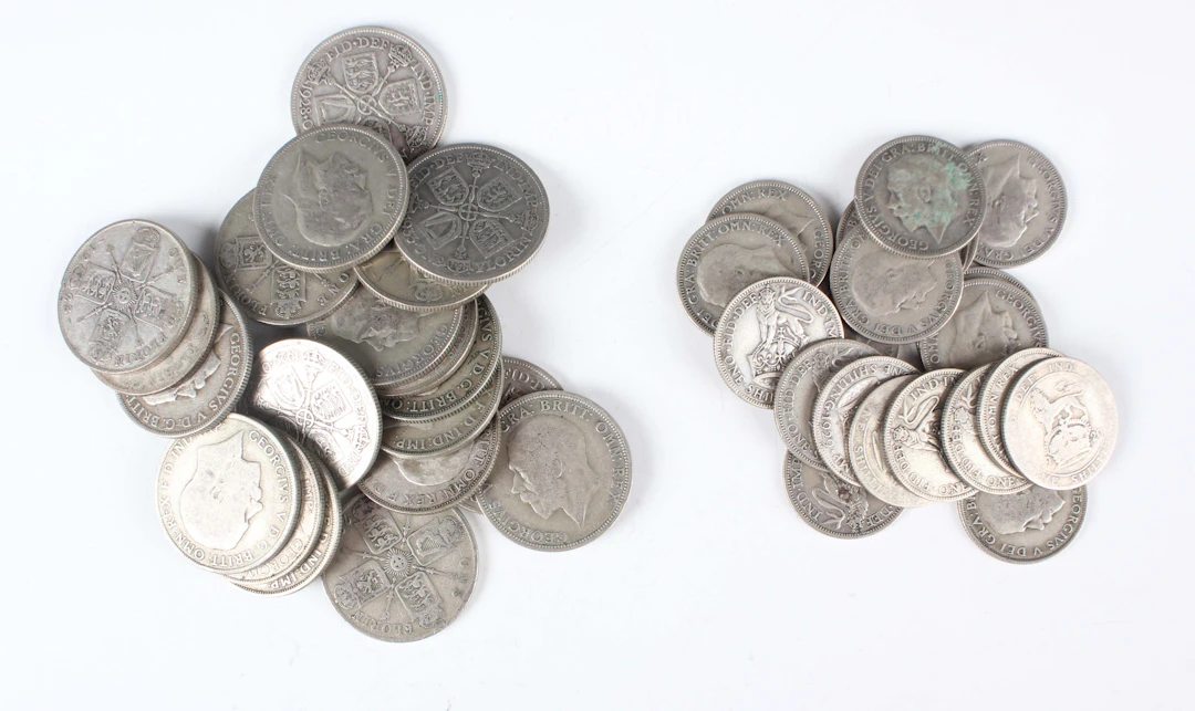 A group of pre-1947 British silver coinage, comprising twenty George