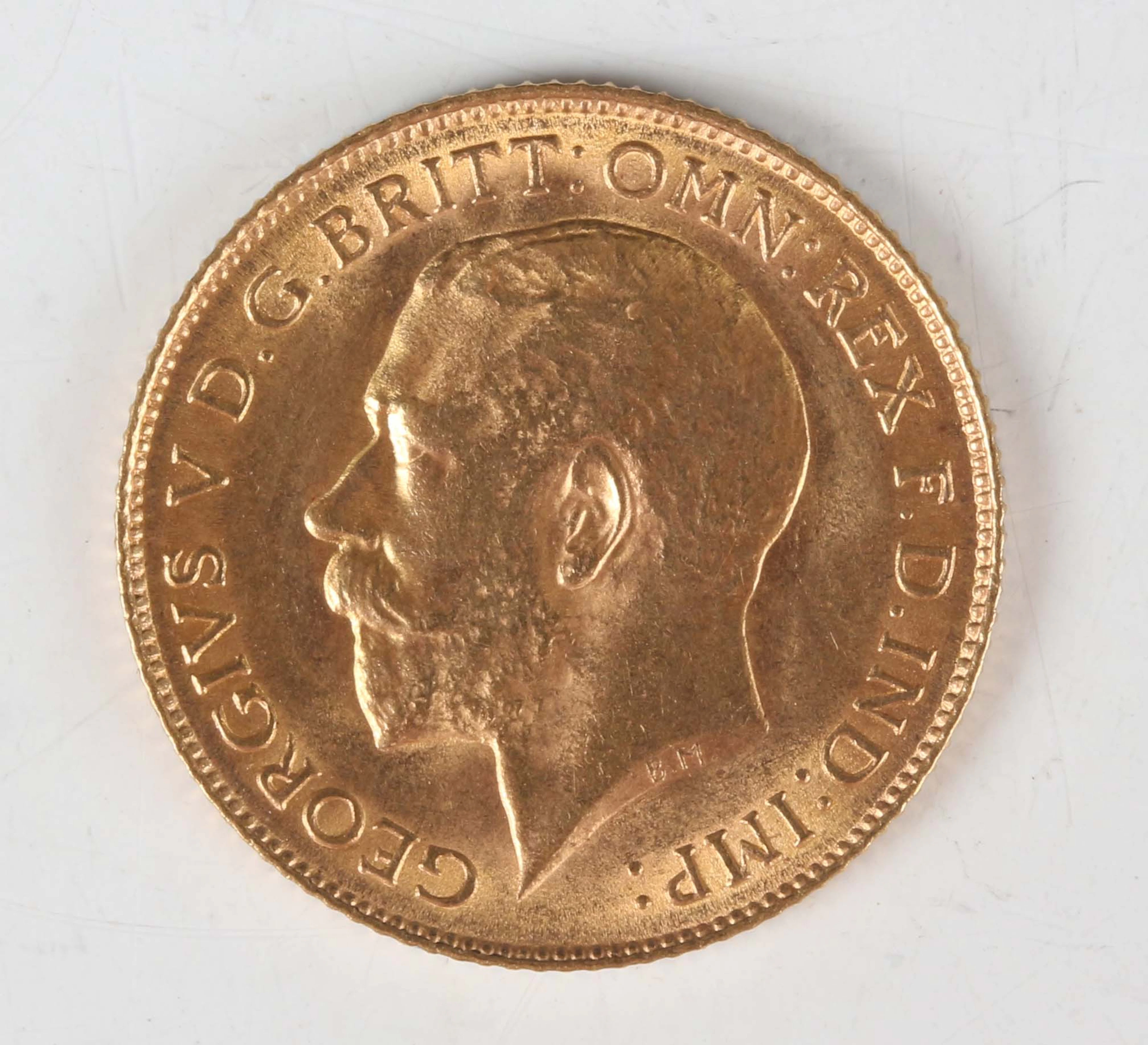 A George V half-sovereign 1915. Note: this lot includes an HMRC classified
