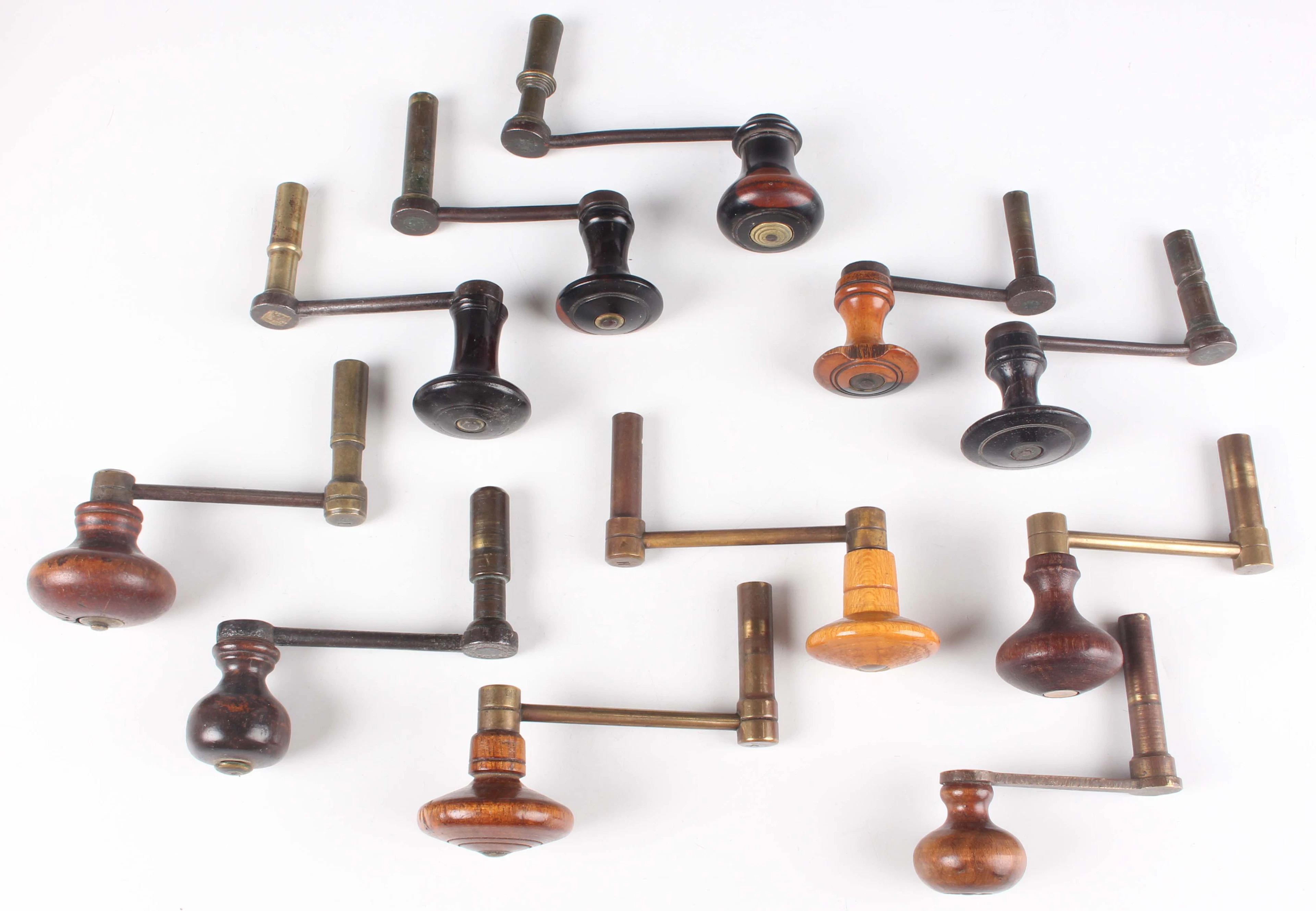 A collection of eleven longcase clock winders, some 19th century