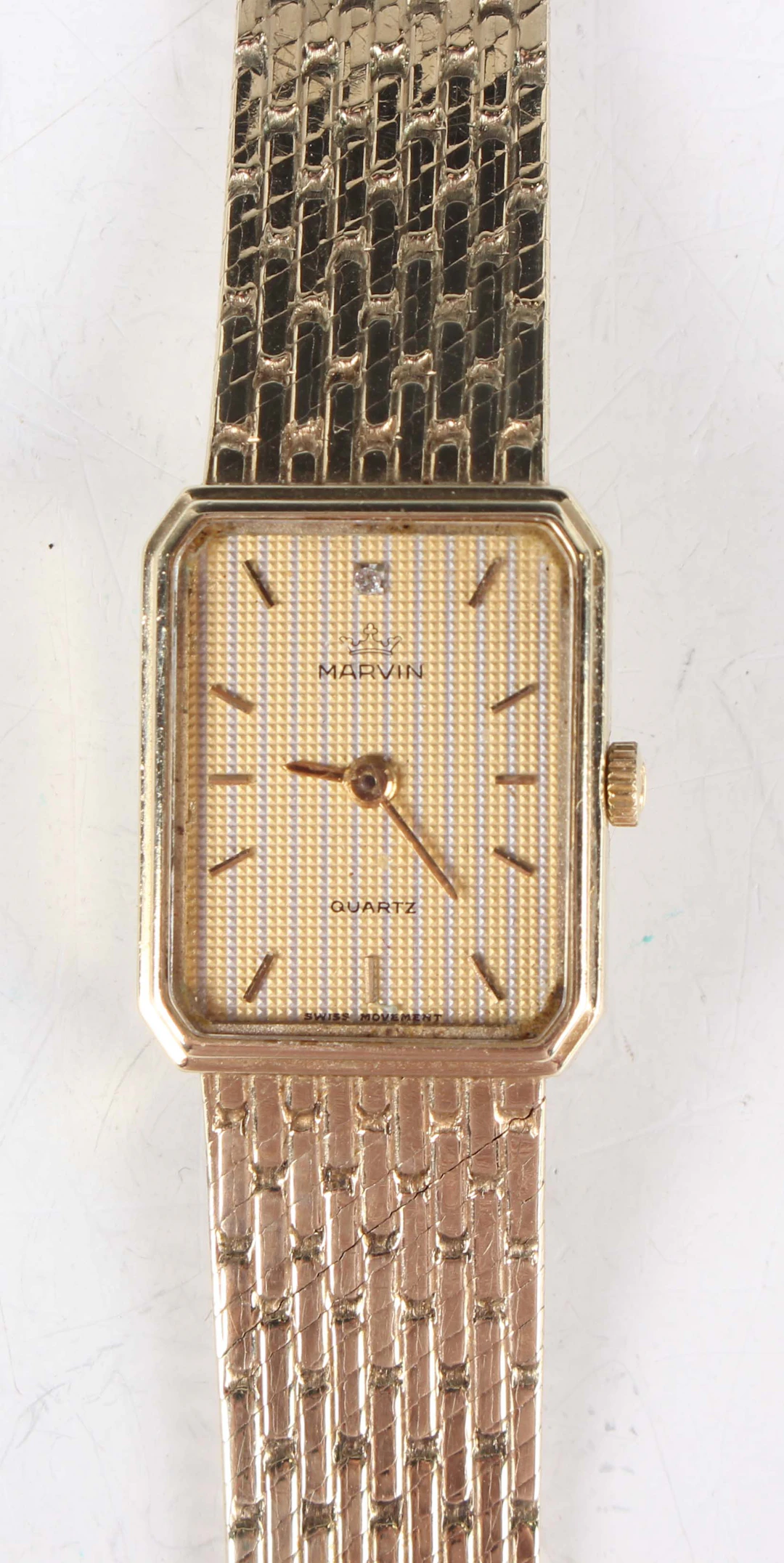 A Marvin 9ct gold lady's bracelet wristwatch with quartz movement