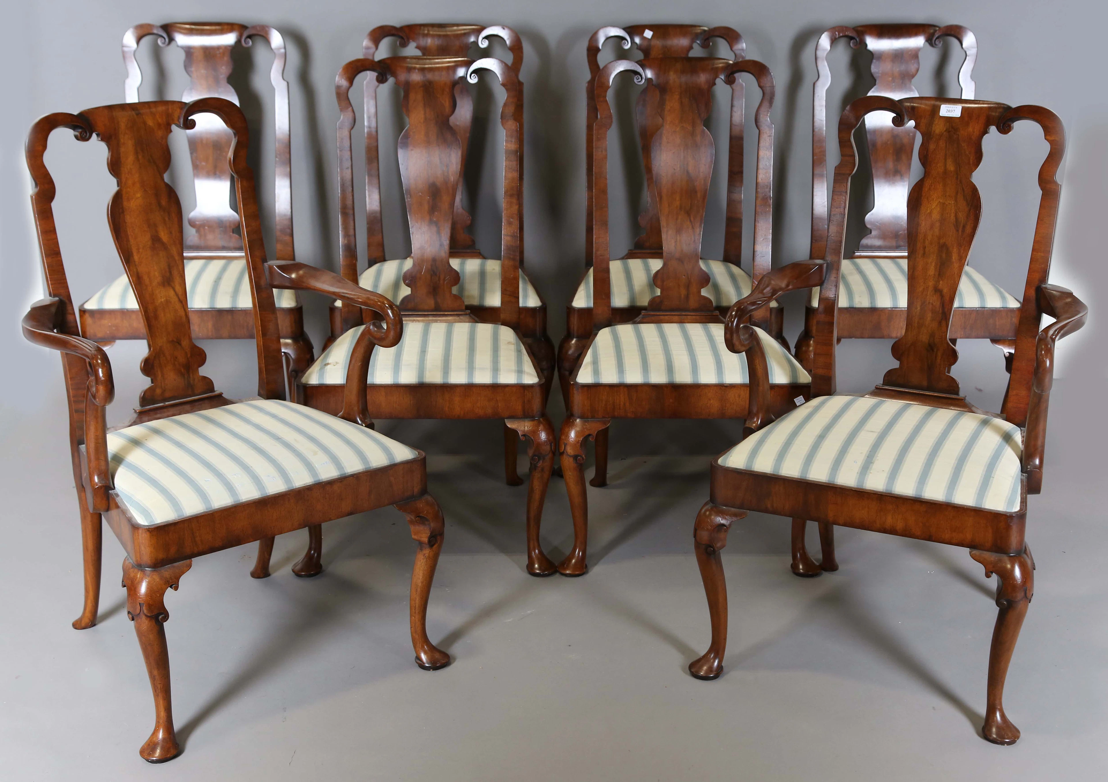 A set of eight mid-20th century Queen Anne style walnut dining chairs
