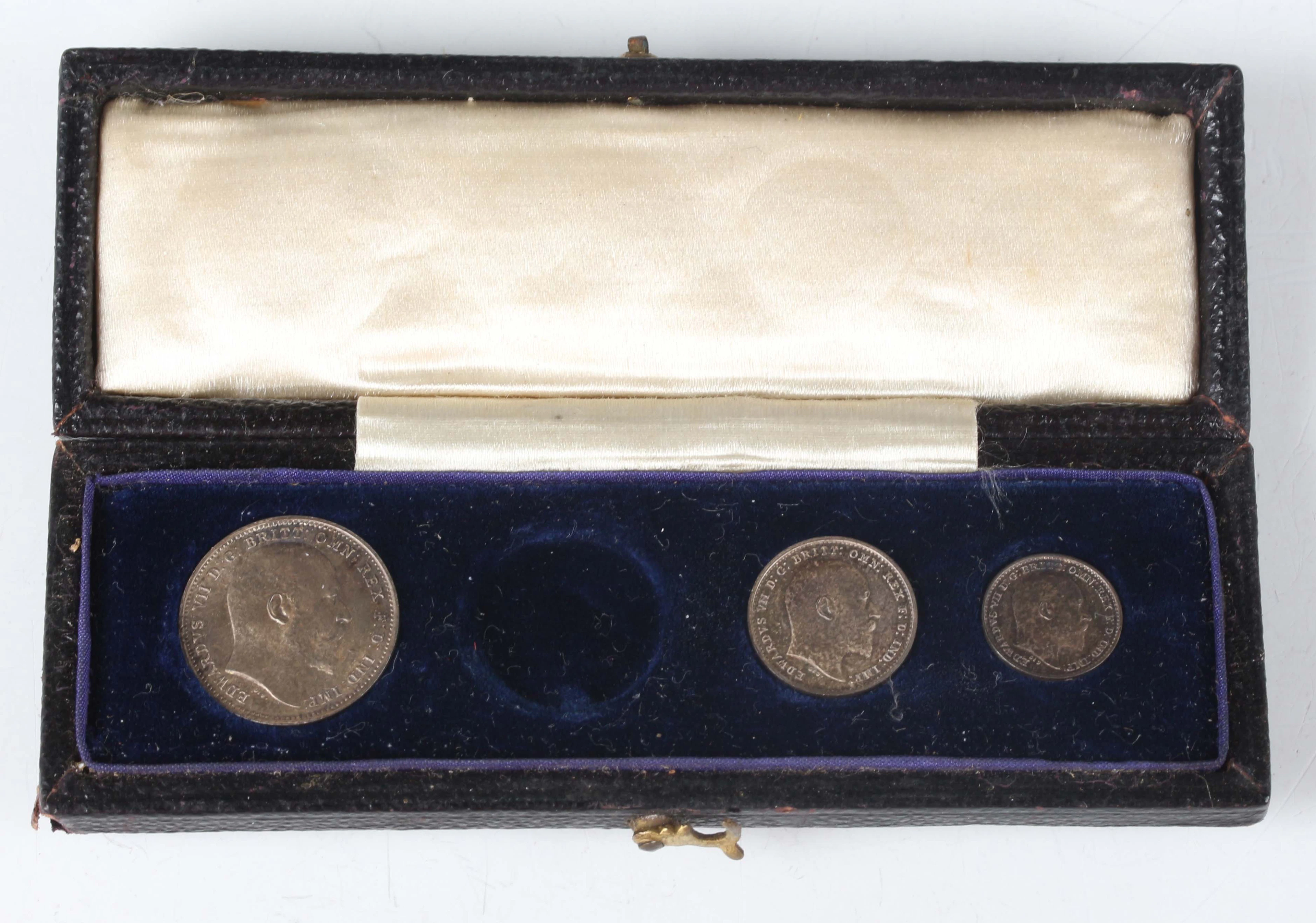 An Edward VII Maundy coin part-set 1907 (lacking threepence), with