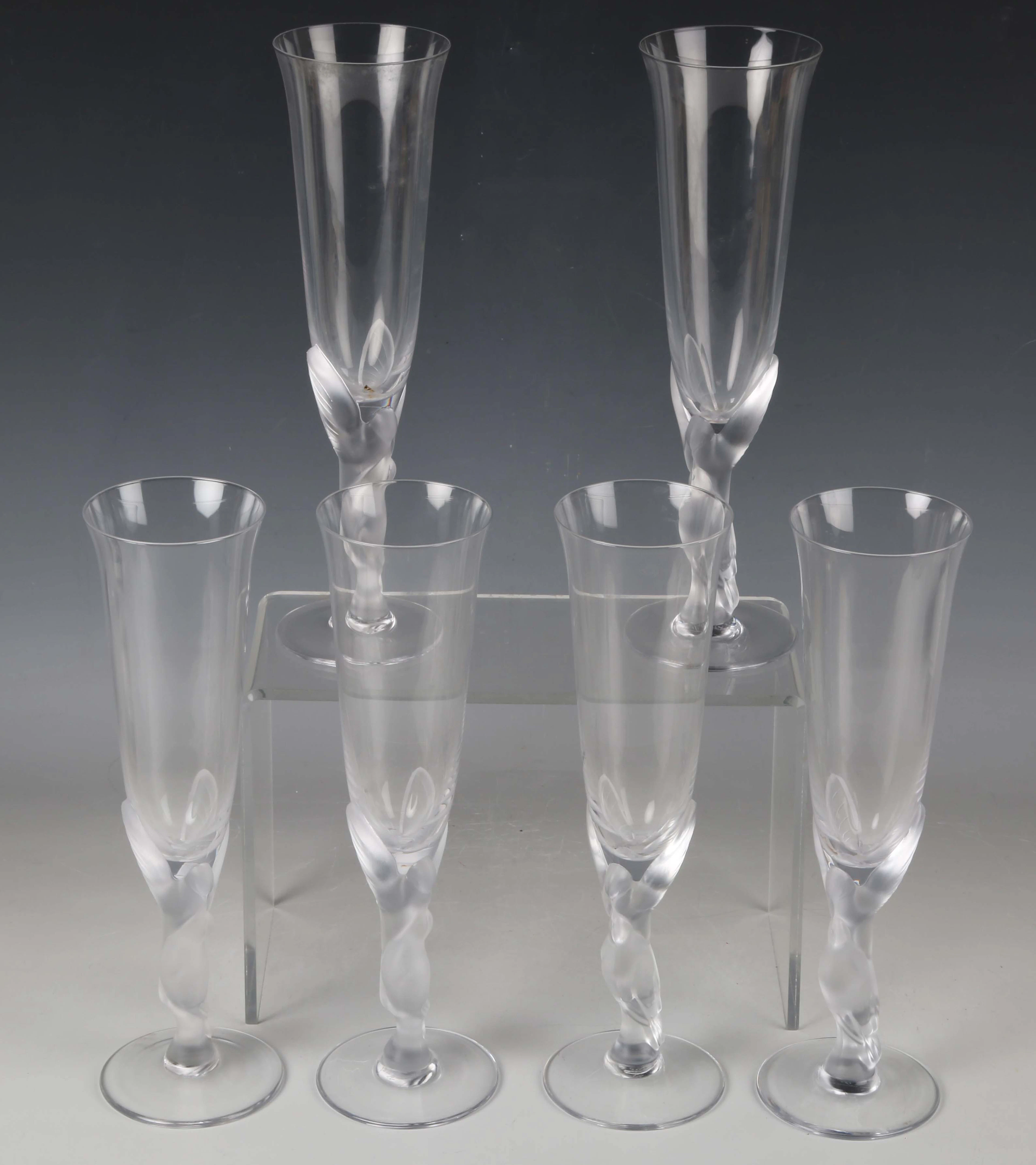 A set of six Fabergé glass Snow Dove pattern champagne flutes, designed