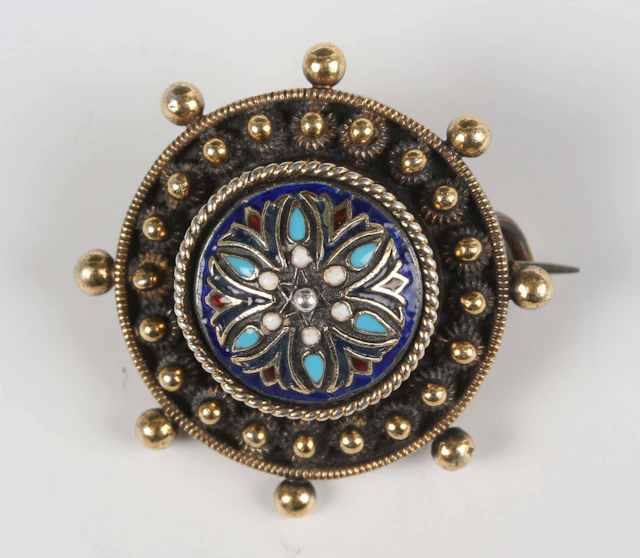 A Norwegian David Andersen .830 silver and polychrome enamelled circular