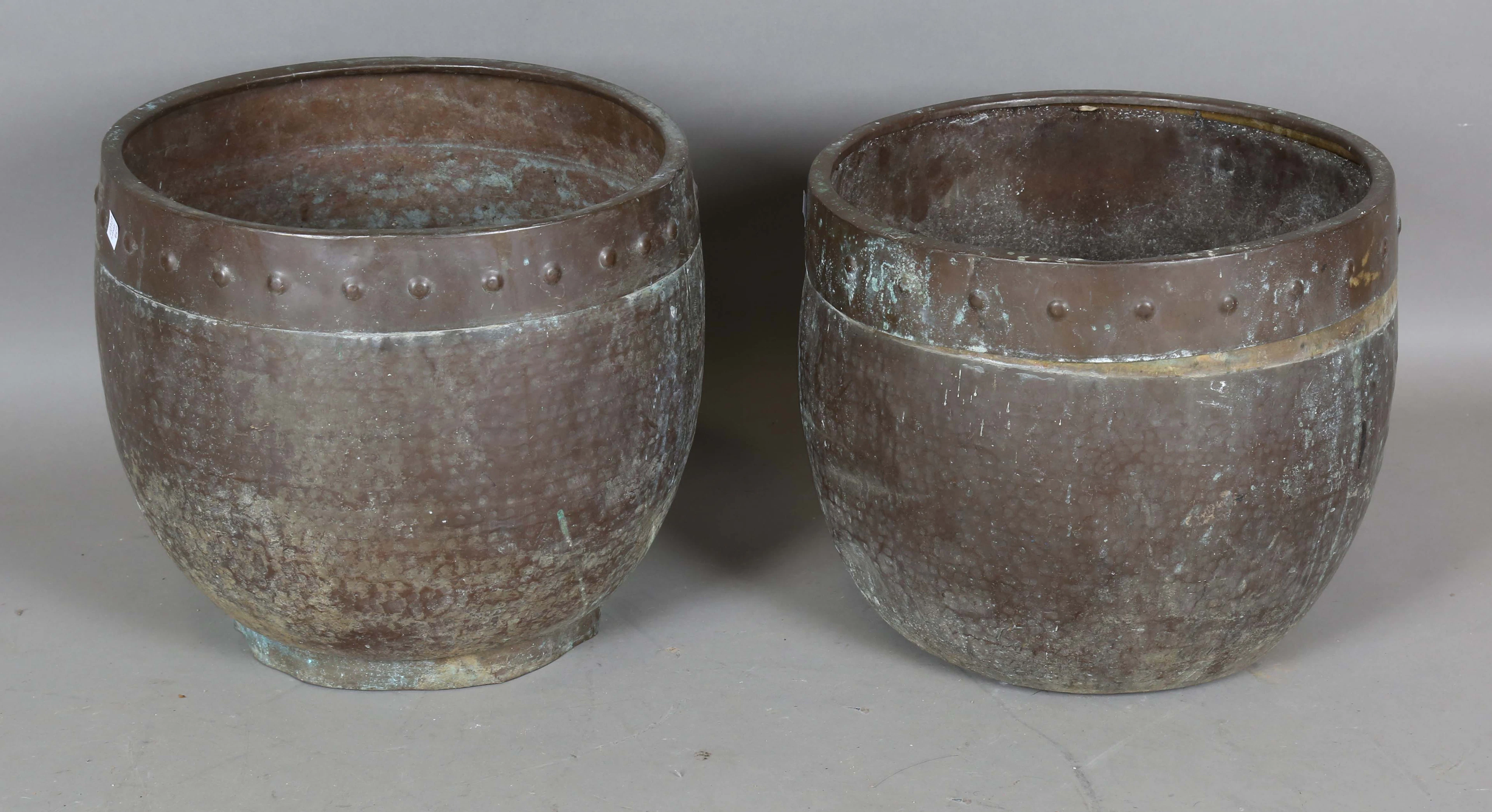 A pair of early 20th century patinated copper jardinières, height