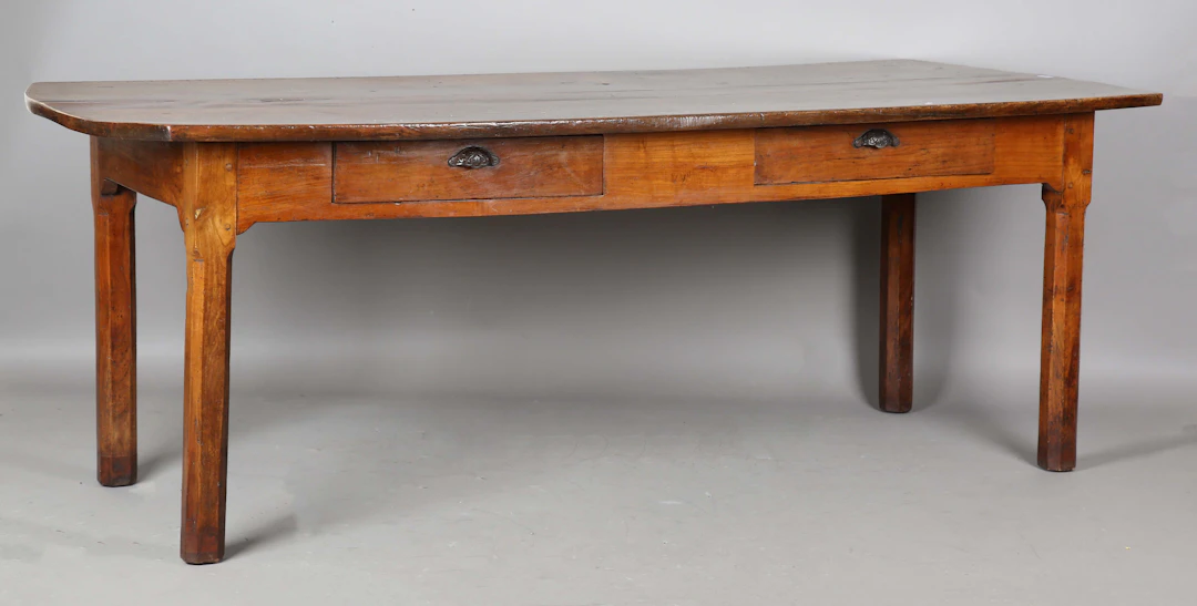A 19th century French cherry farmhouse table, the three-piece top