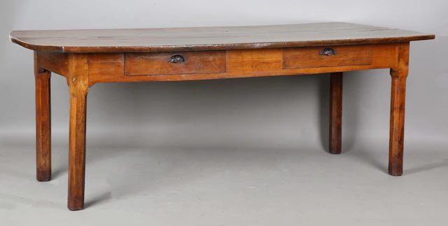 A 19th century French cherry farmhouse table, the three-piece top